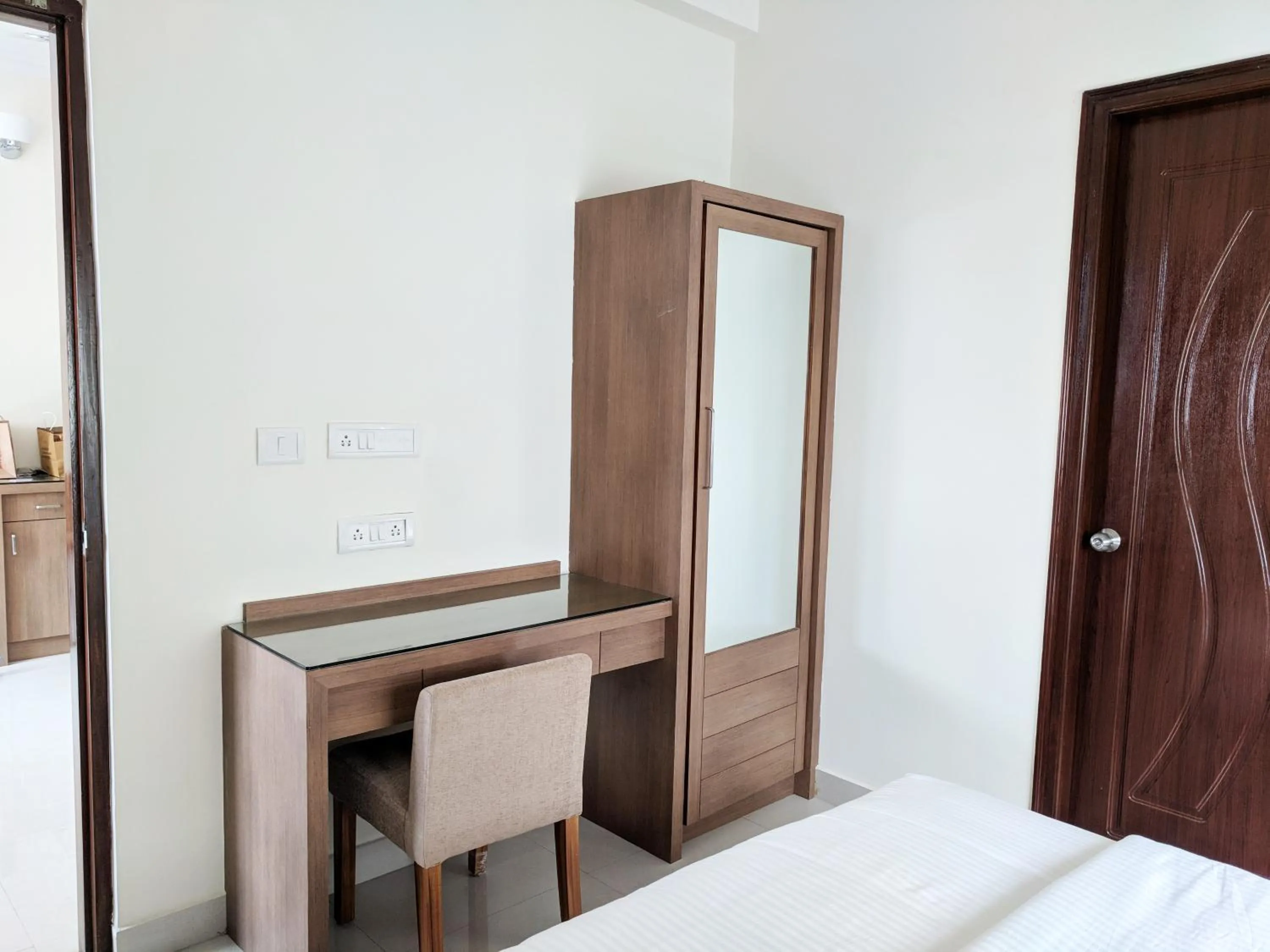 Bed in Clyford Suites