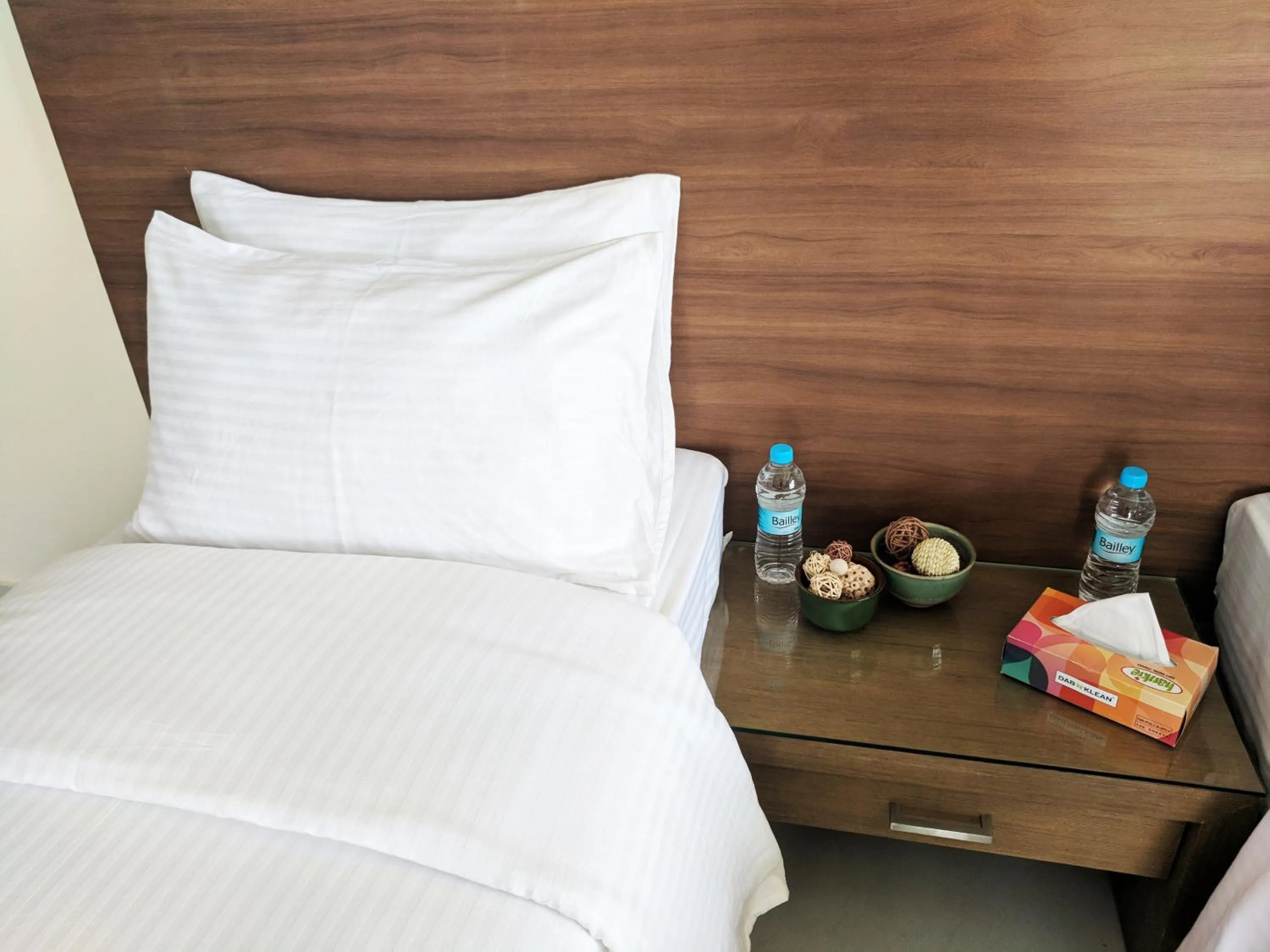 Bed in Clyford Suites