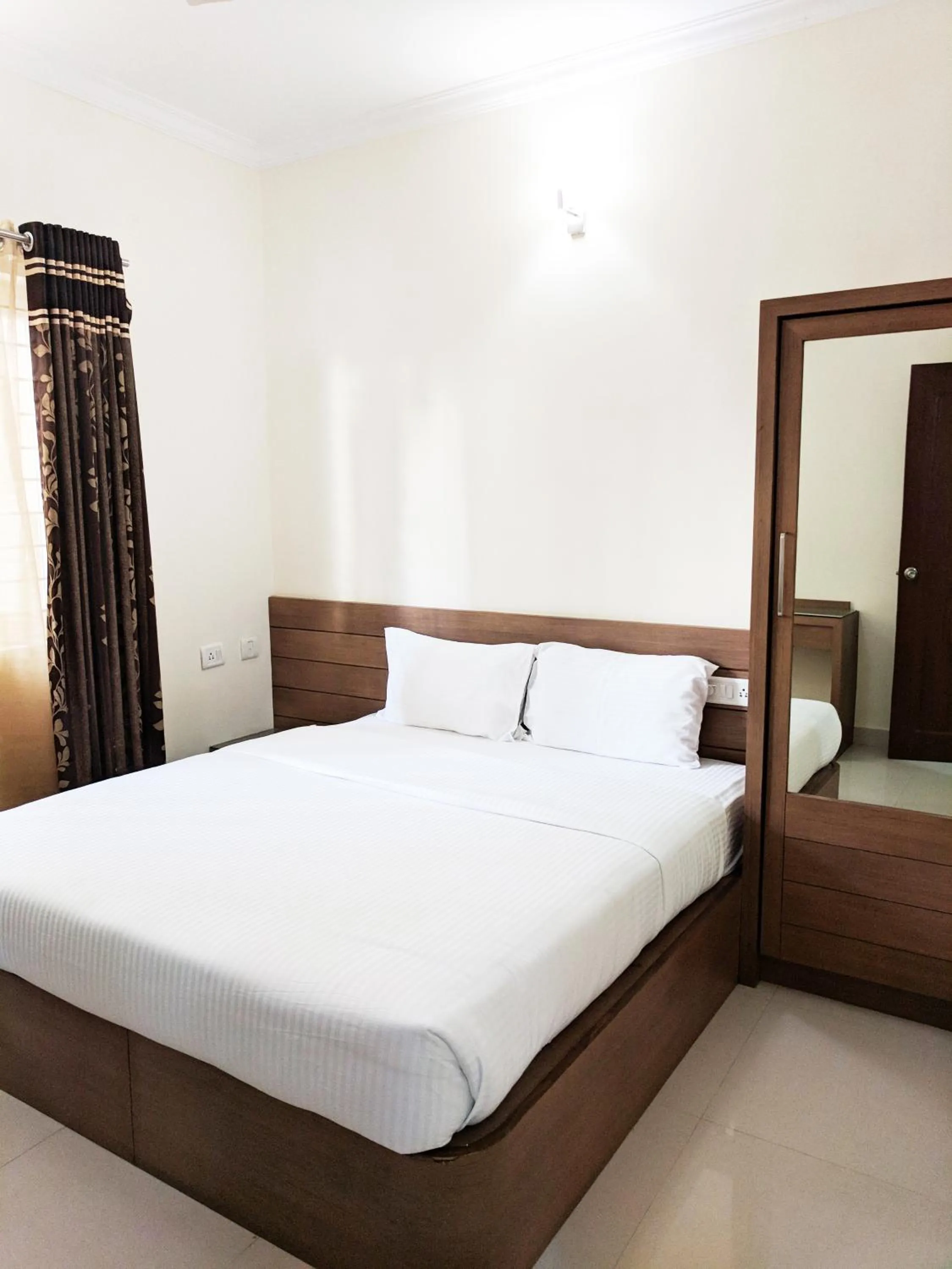 Bed in Clyford Suites