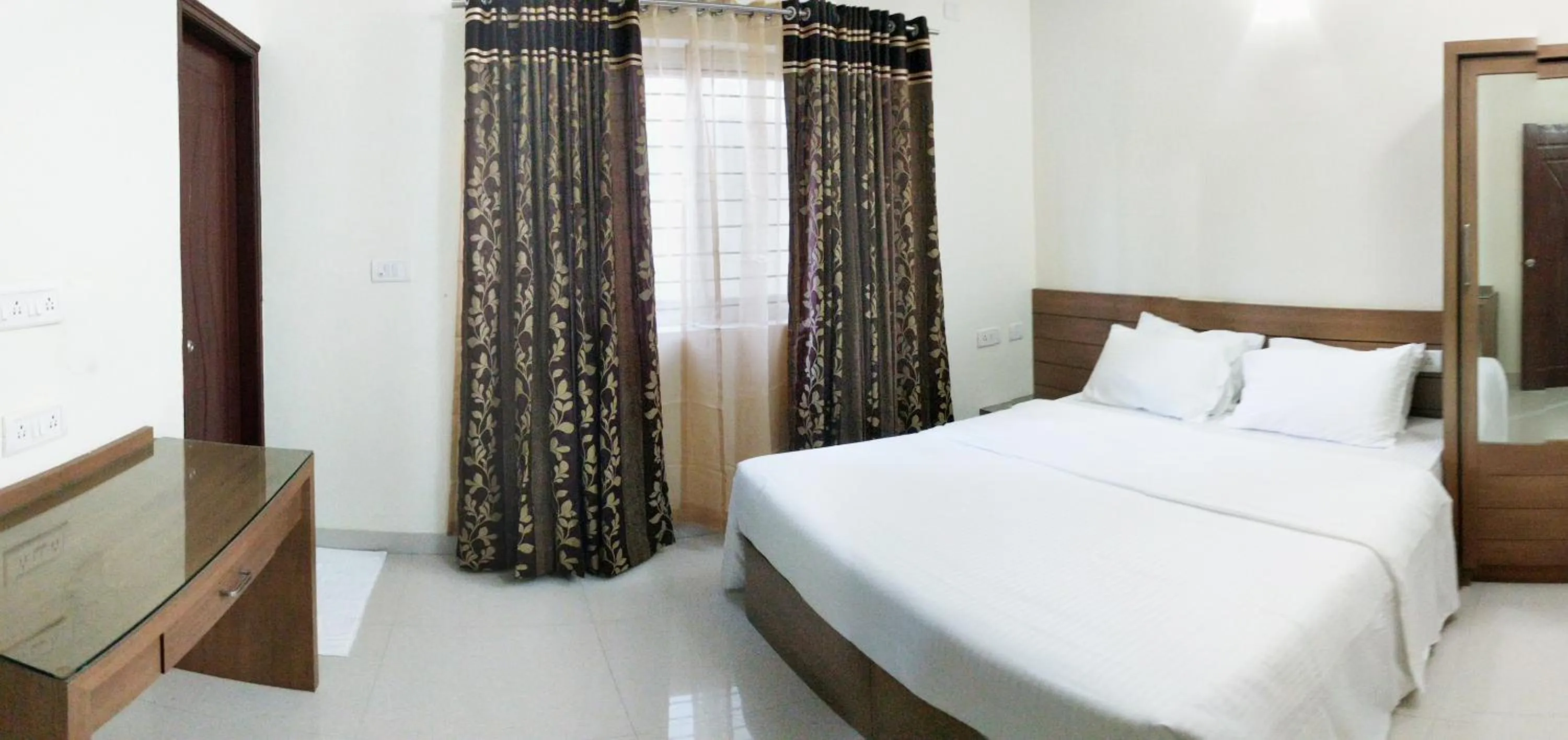 Bed in Clyford Suites