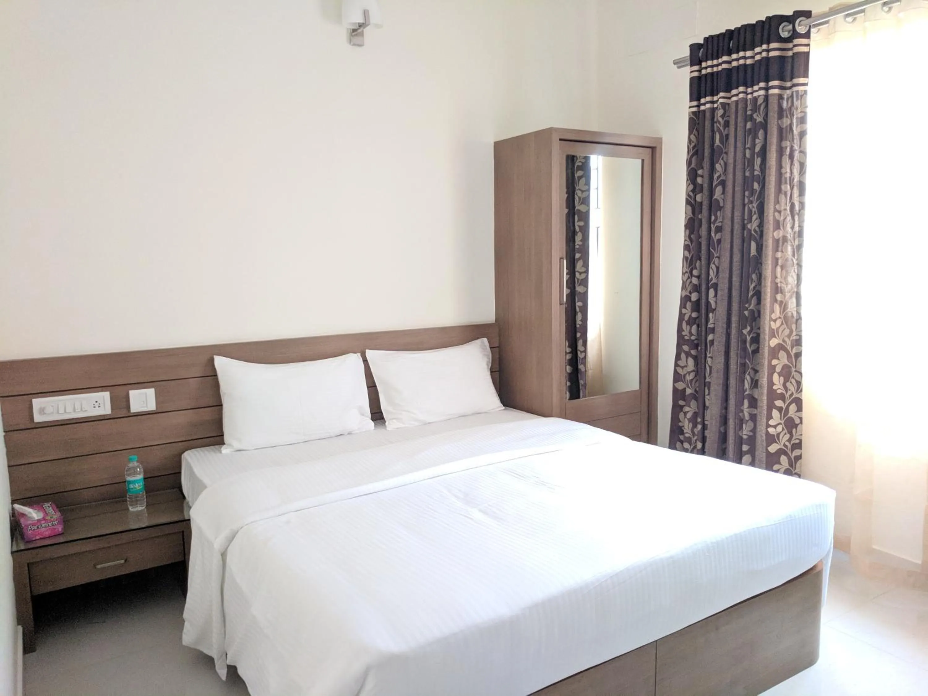 Bed in Clyford Suites