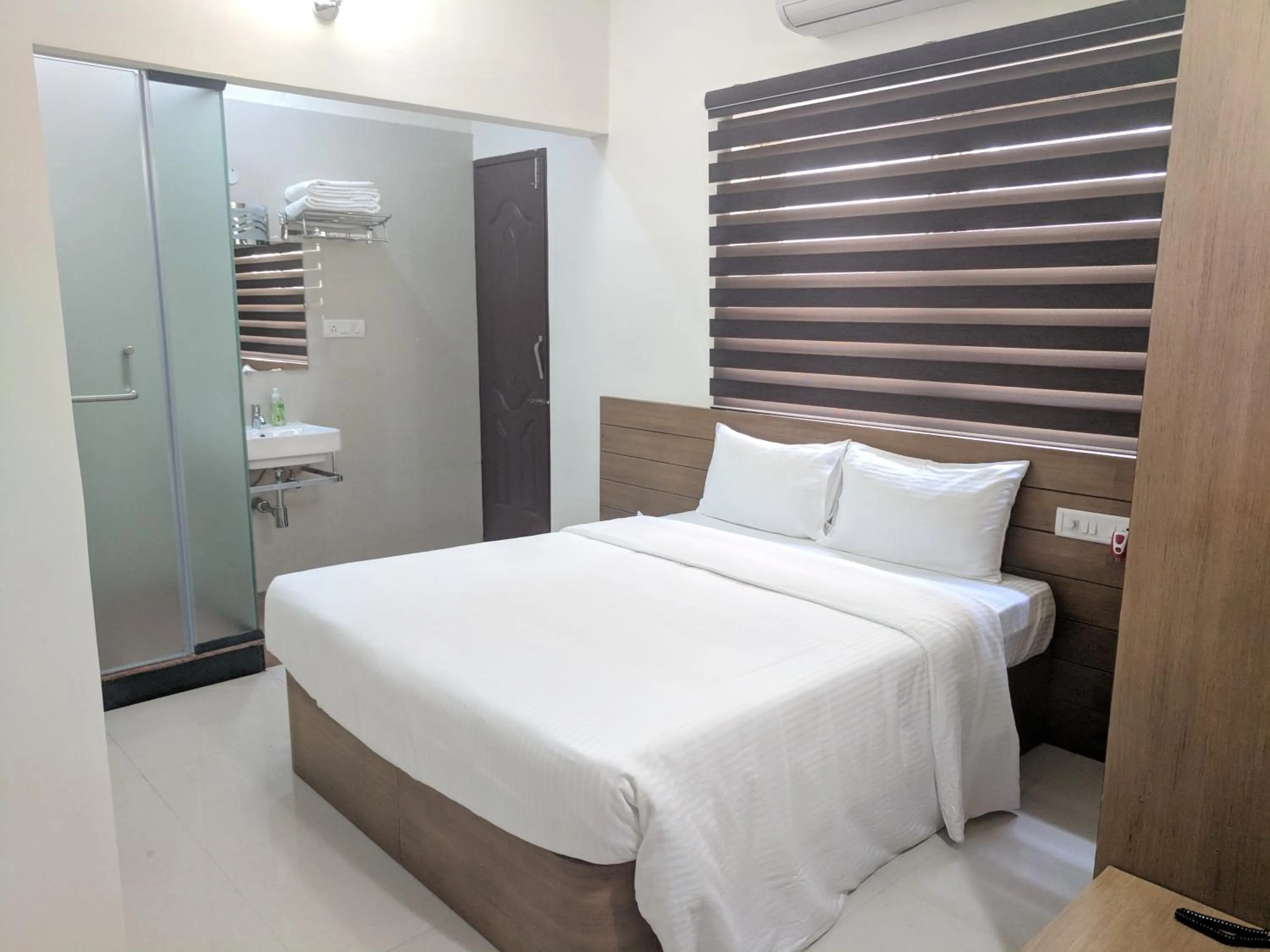 Bed in Clyford Suites