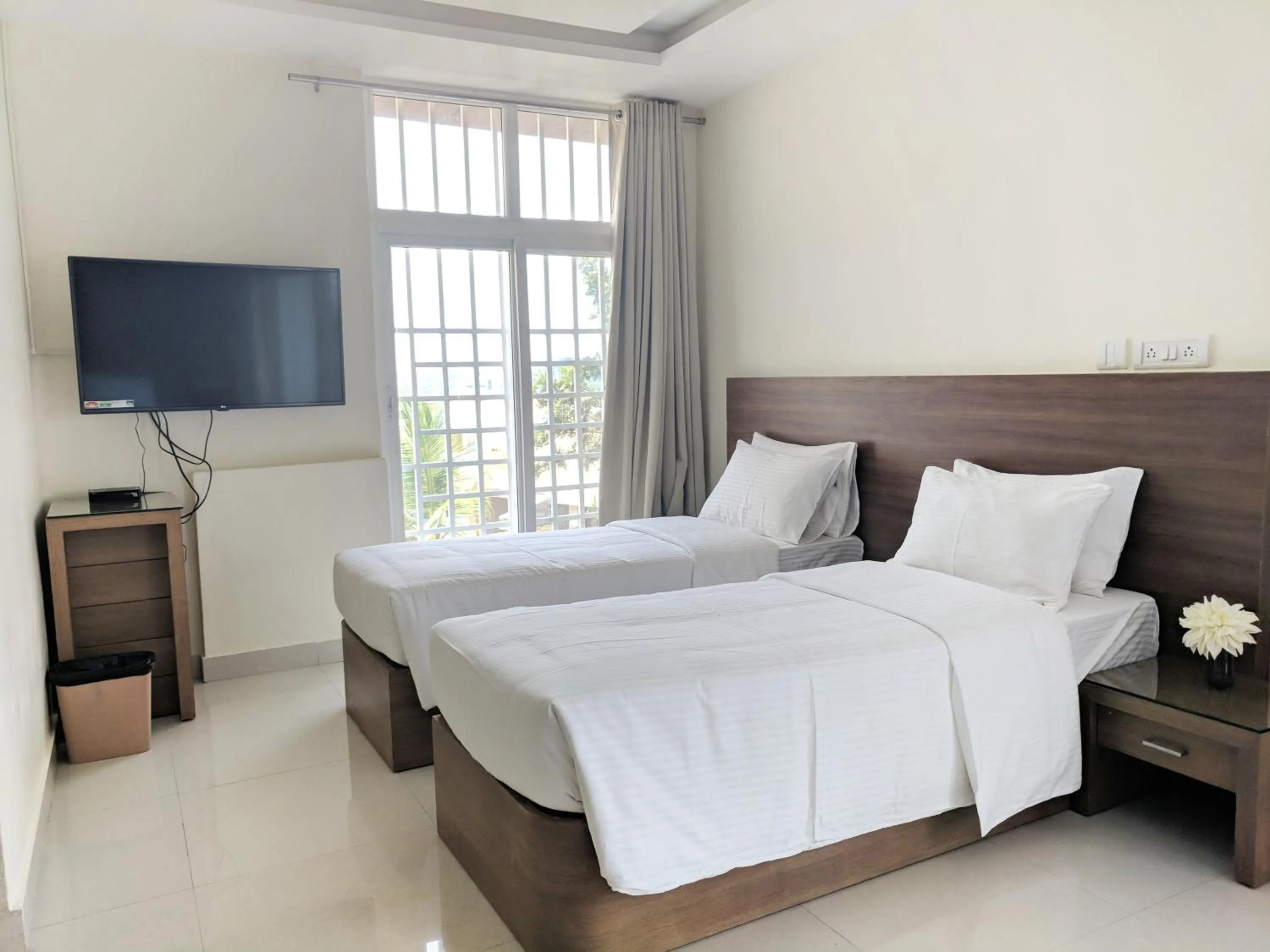 Bed in Clyford Suites