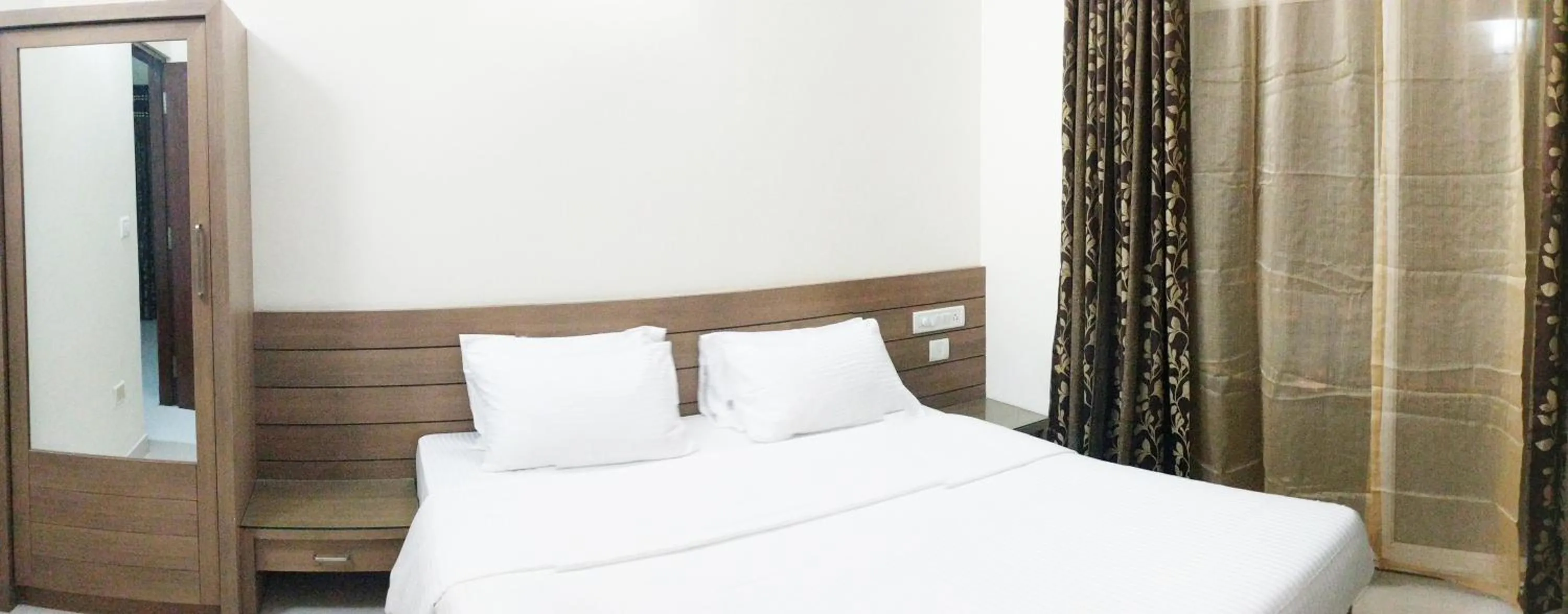 Bed in Clyford Suites