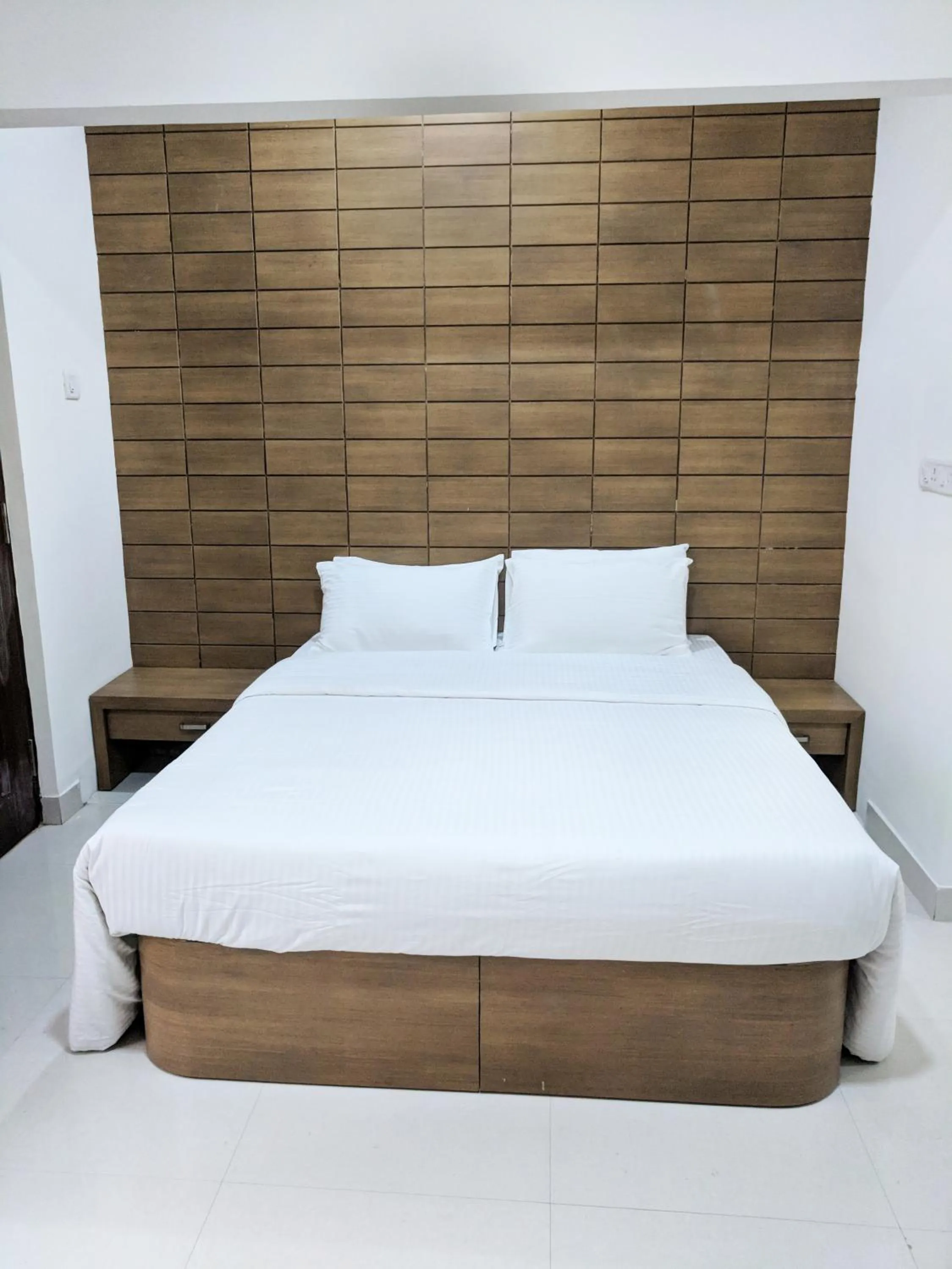 Bed in Clyford Suites