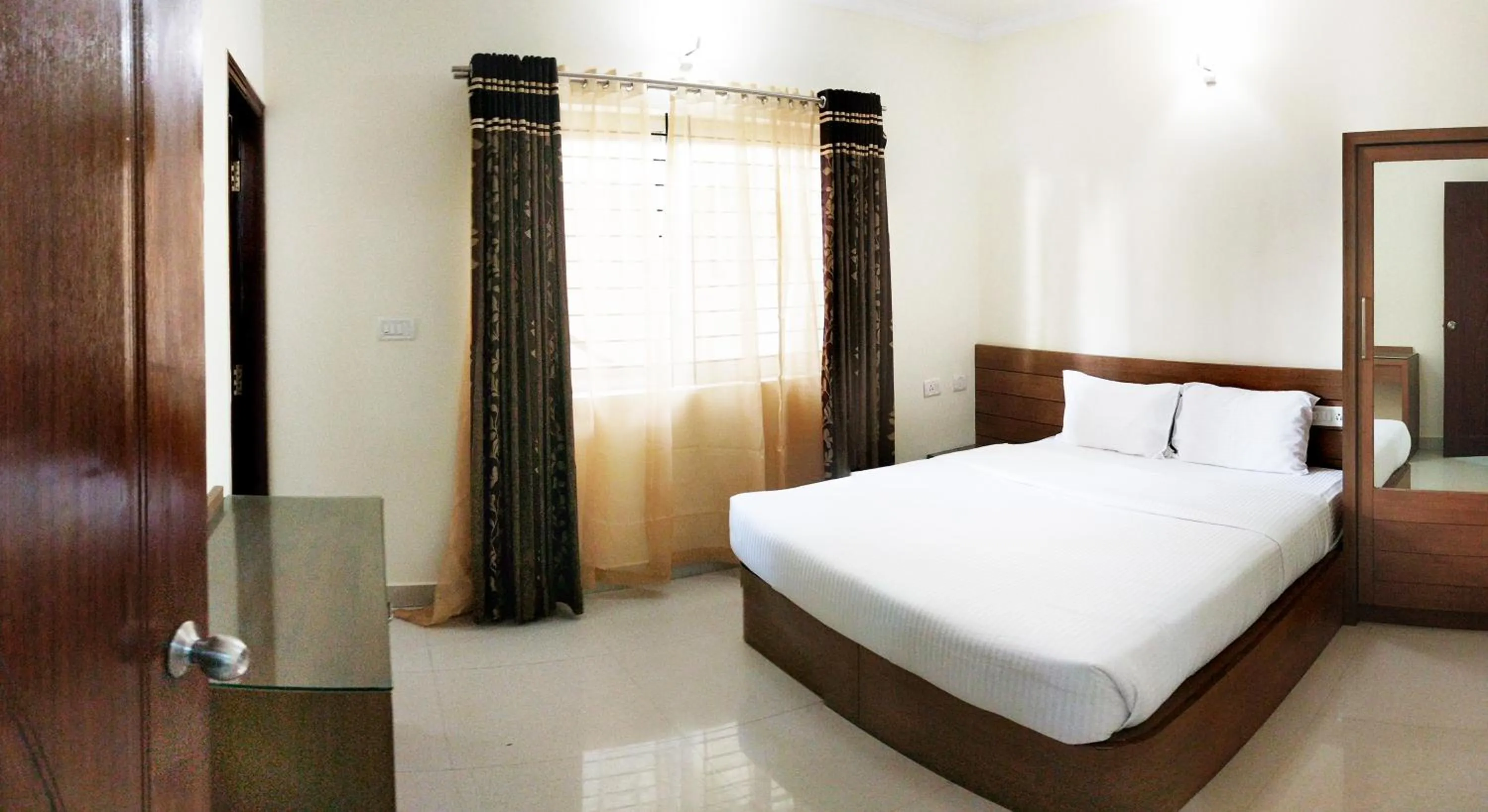 Bed in Clyford Suites