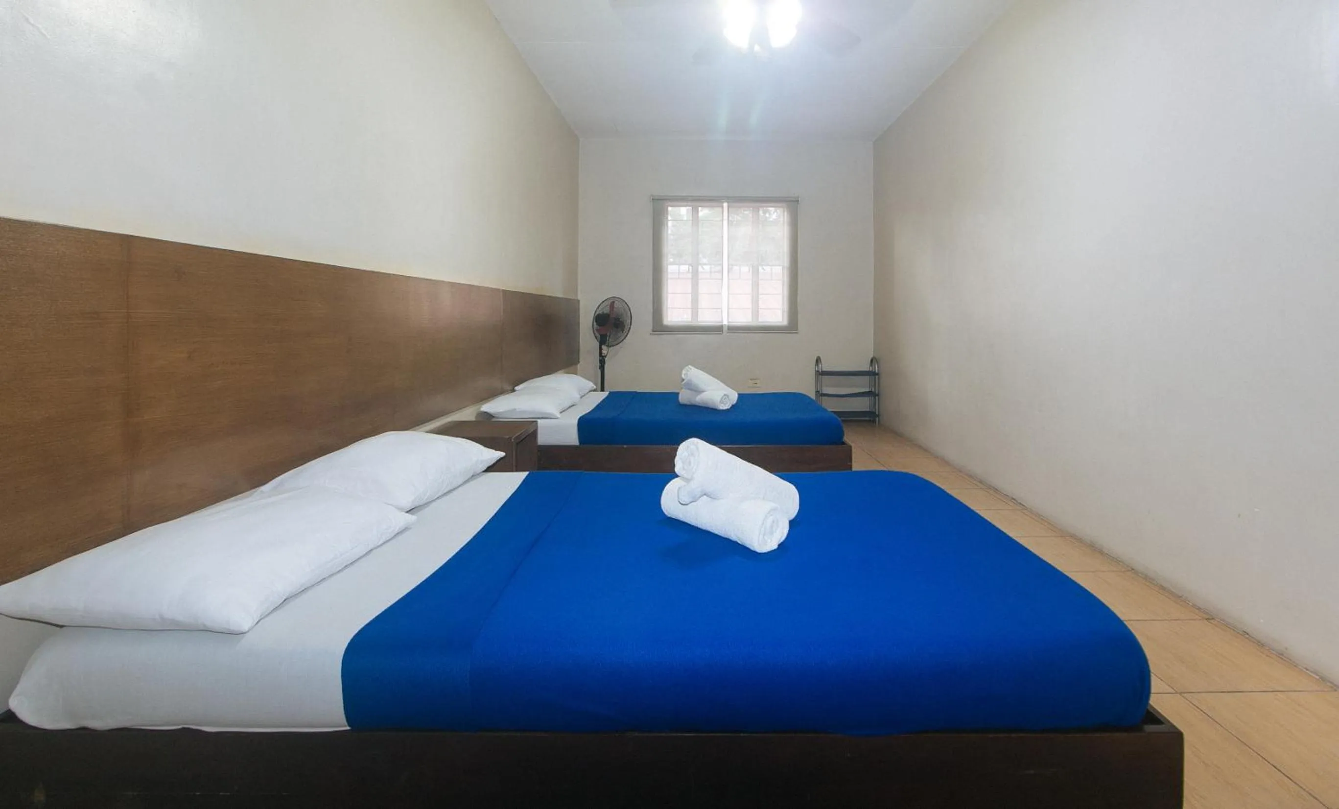 Bed in Metro Deluxe Residences near World Trade Center