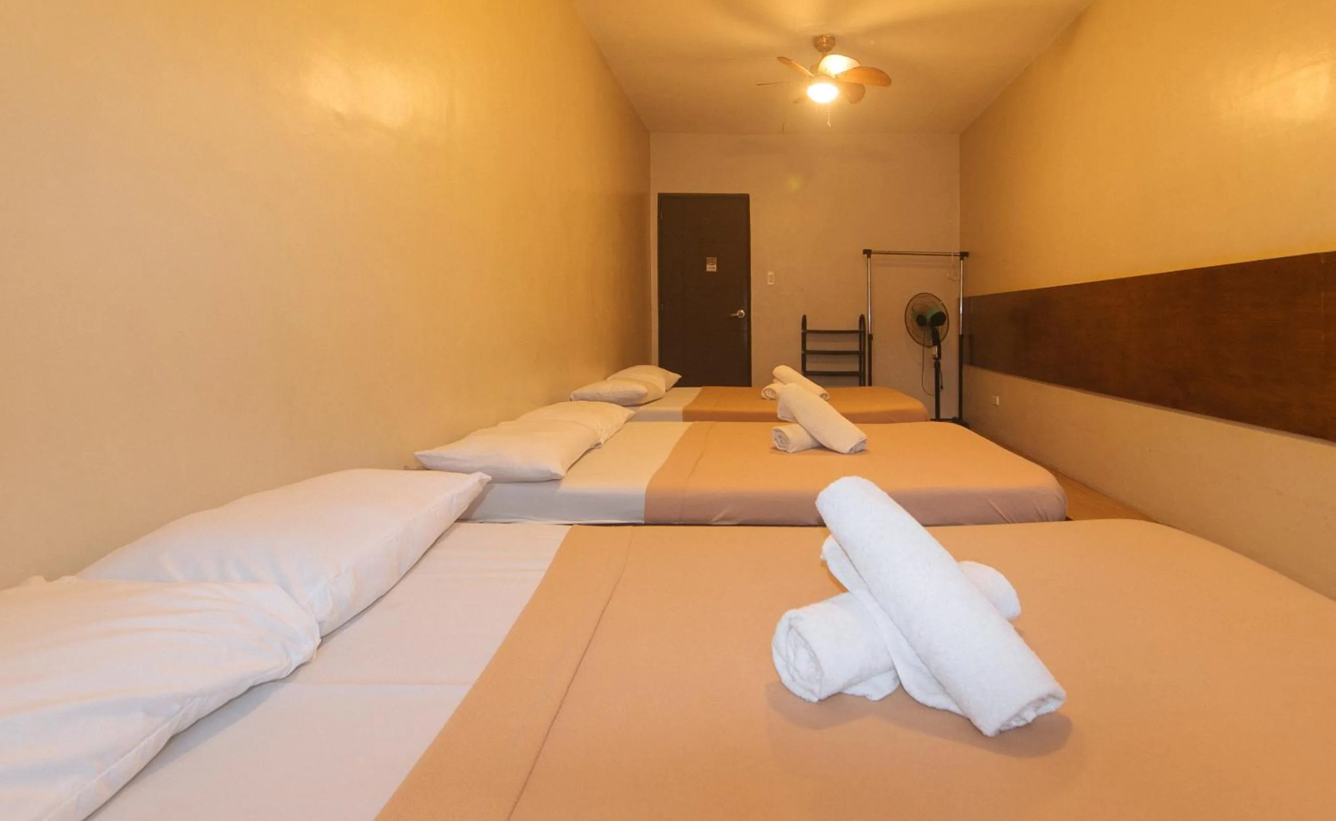 Bed in Metro Deluxe Residences near World Trade Center