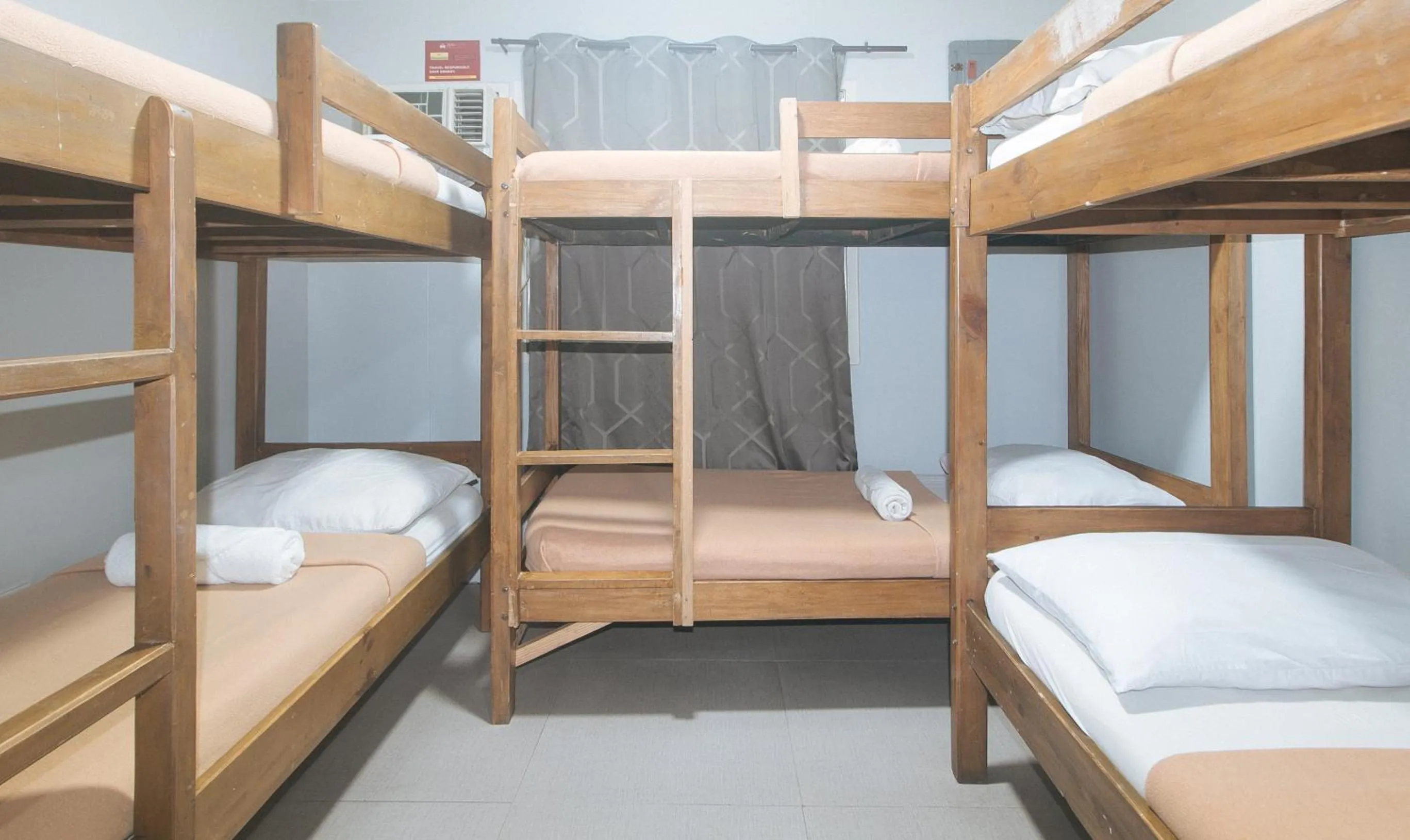 Bed in Metro Deluxe Residences near World Trade Center