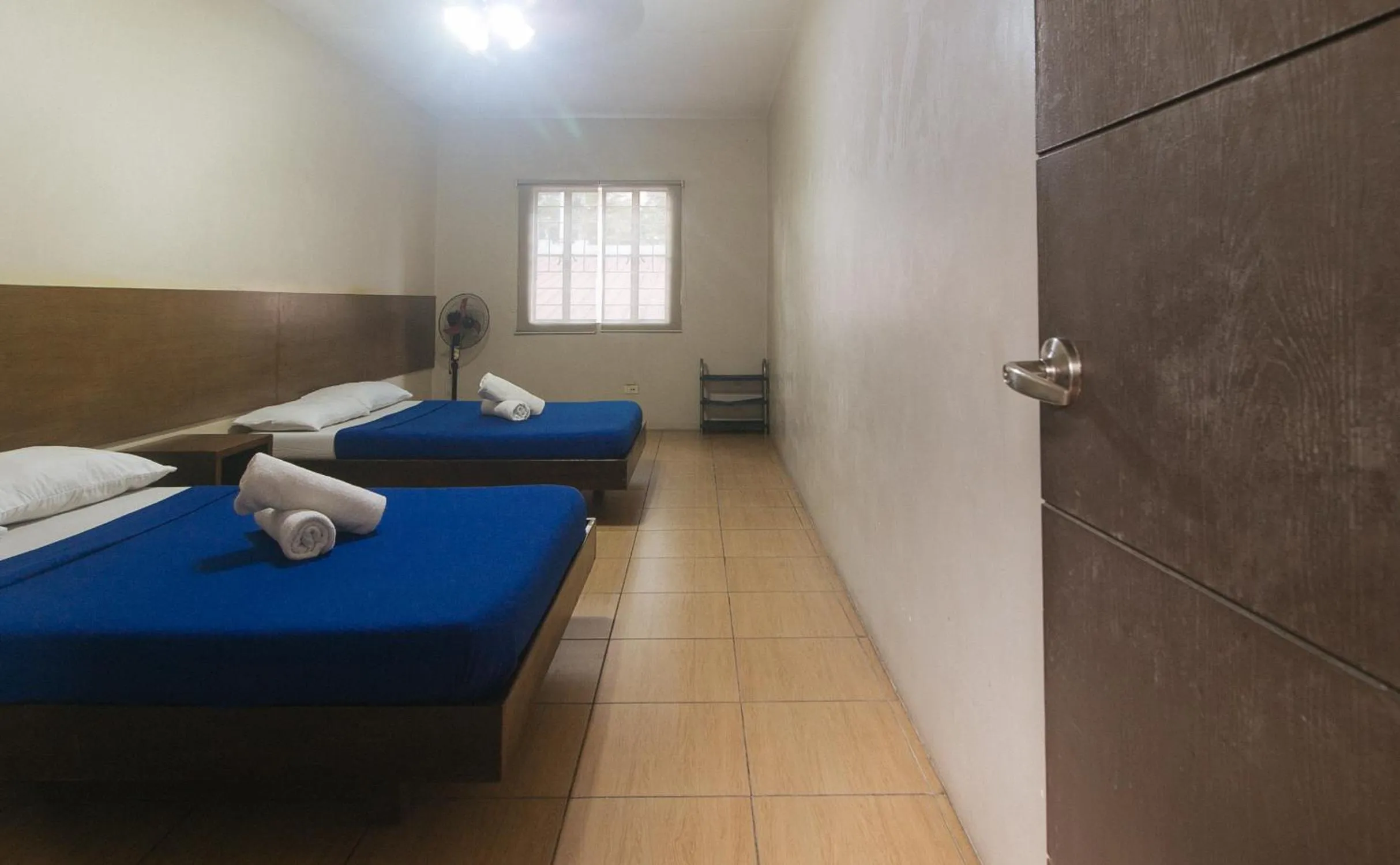 Bed in Metro Deluxe Residences near World Trade Center