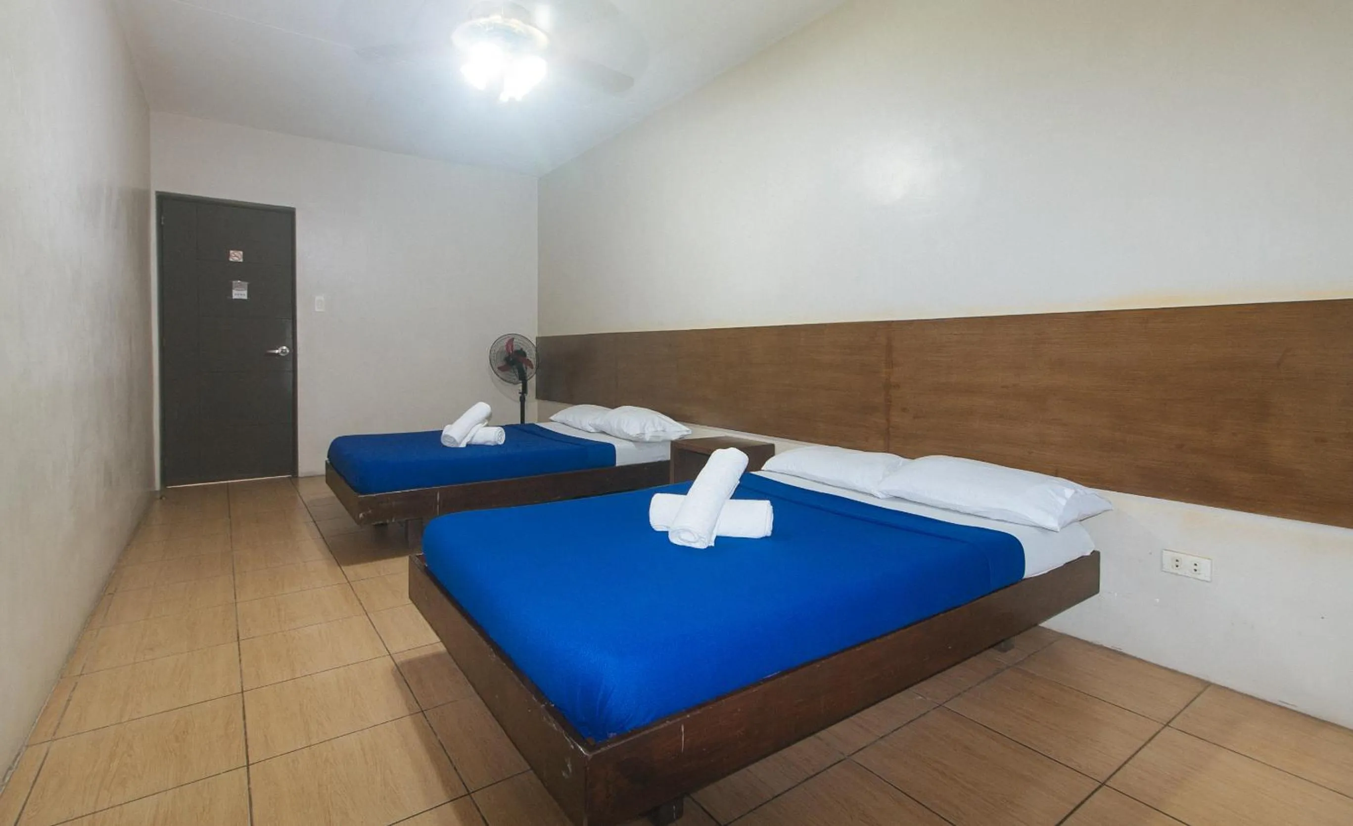 Bed in Metro Deluxe Residences near World Trade Center