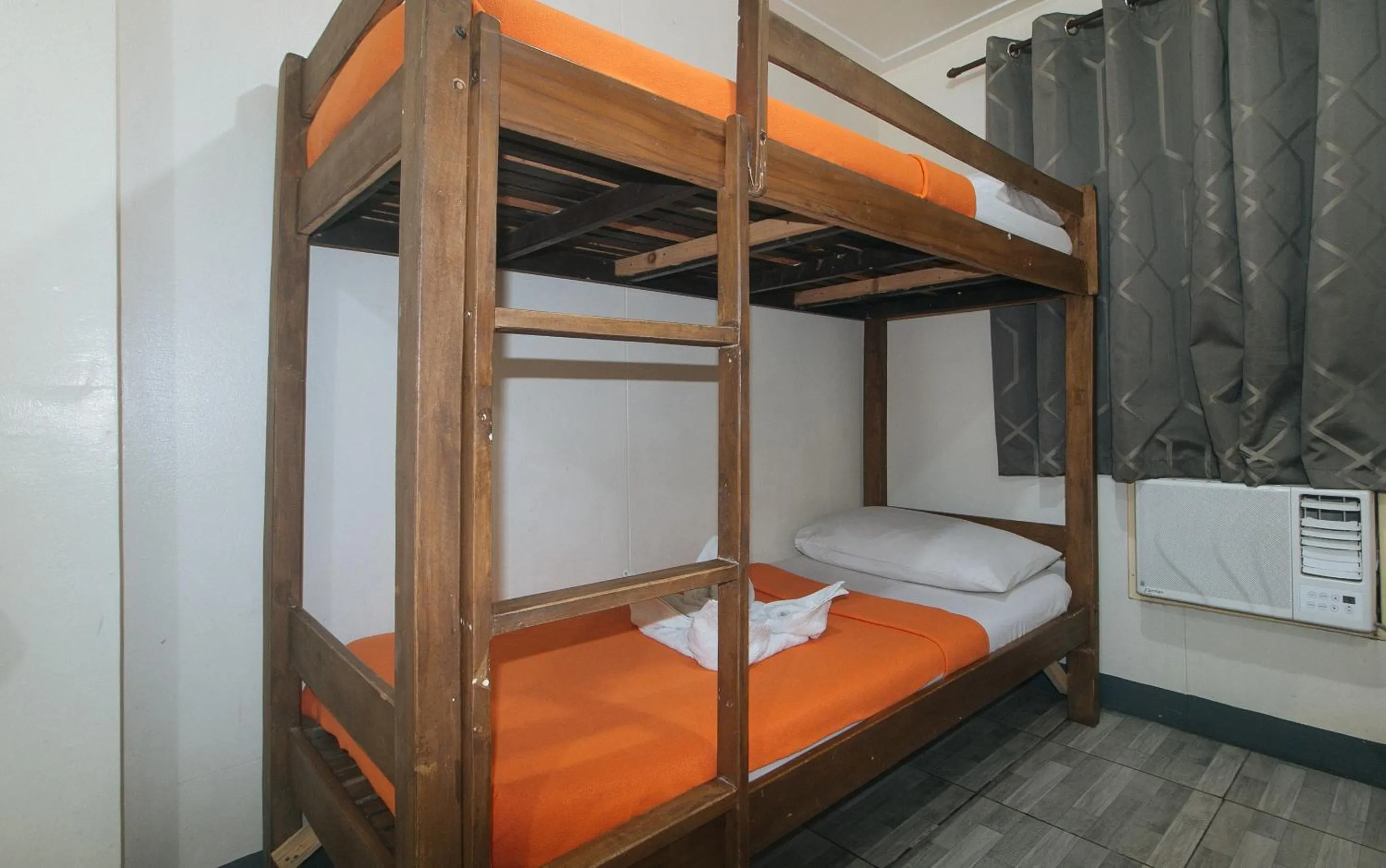 Bed in Metro Deluxe Residences near World Trade Center