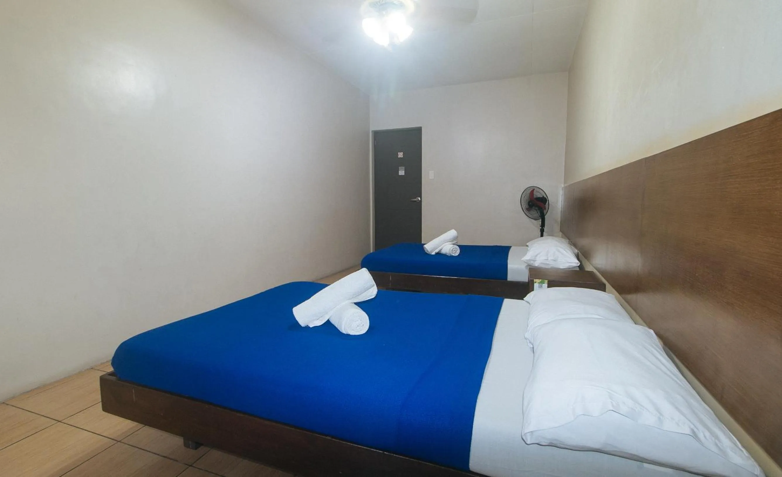 Bed in Metro Deluxe Residences near World Trade Center