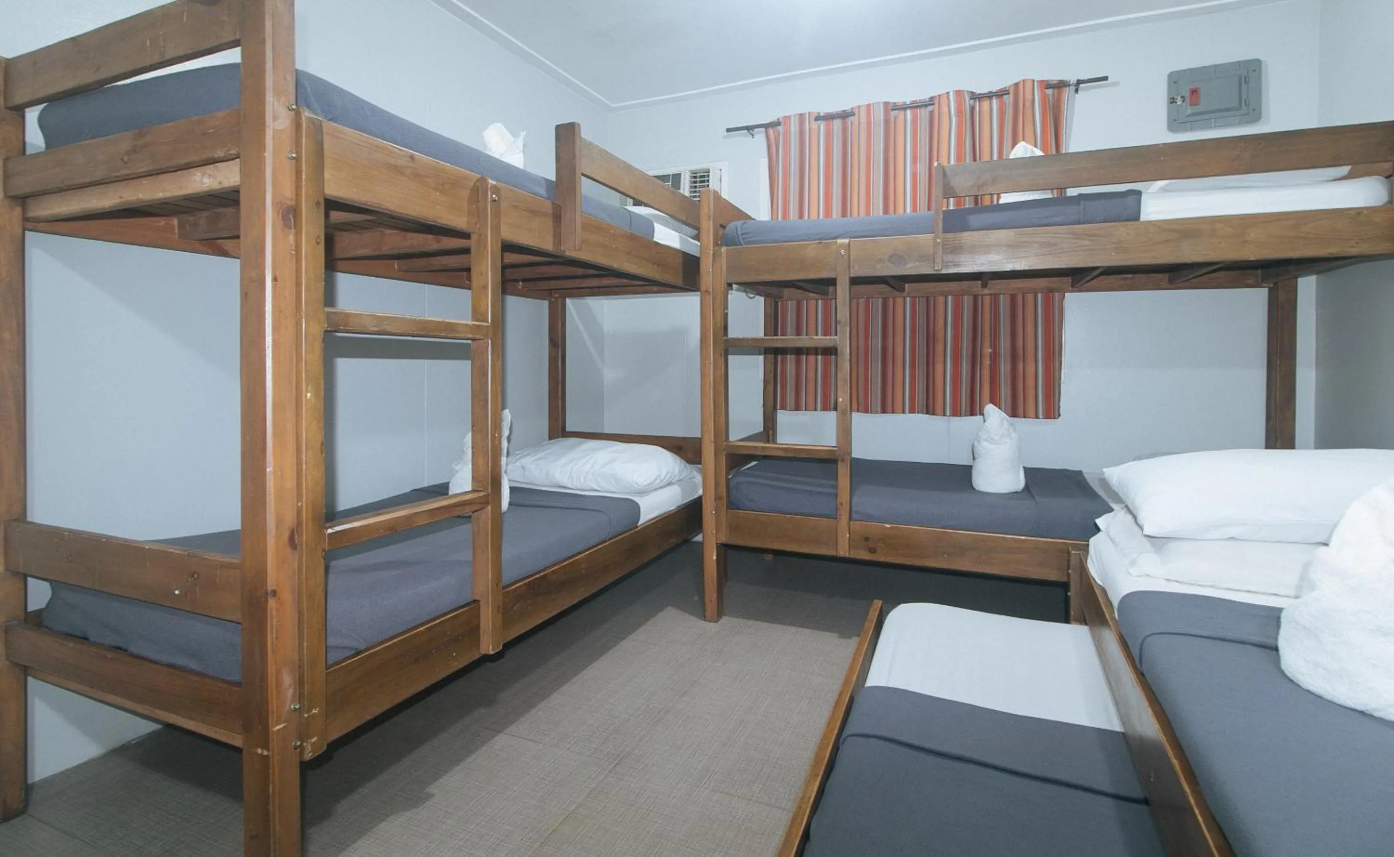 Bed in Metro Deluxe Residences near World Trade Center