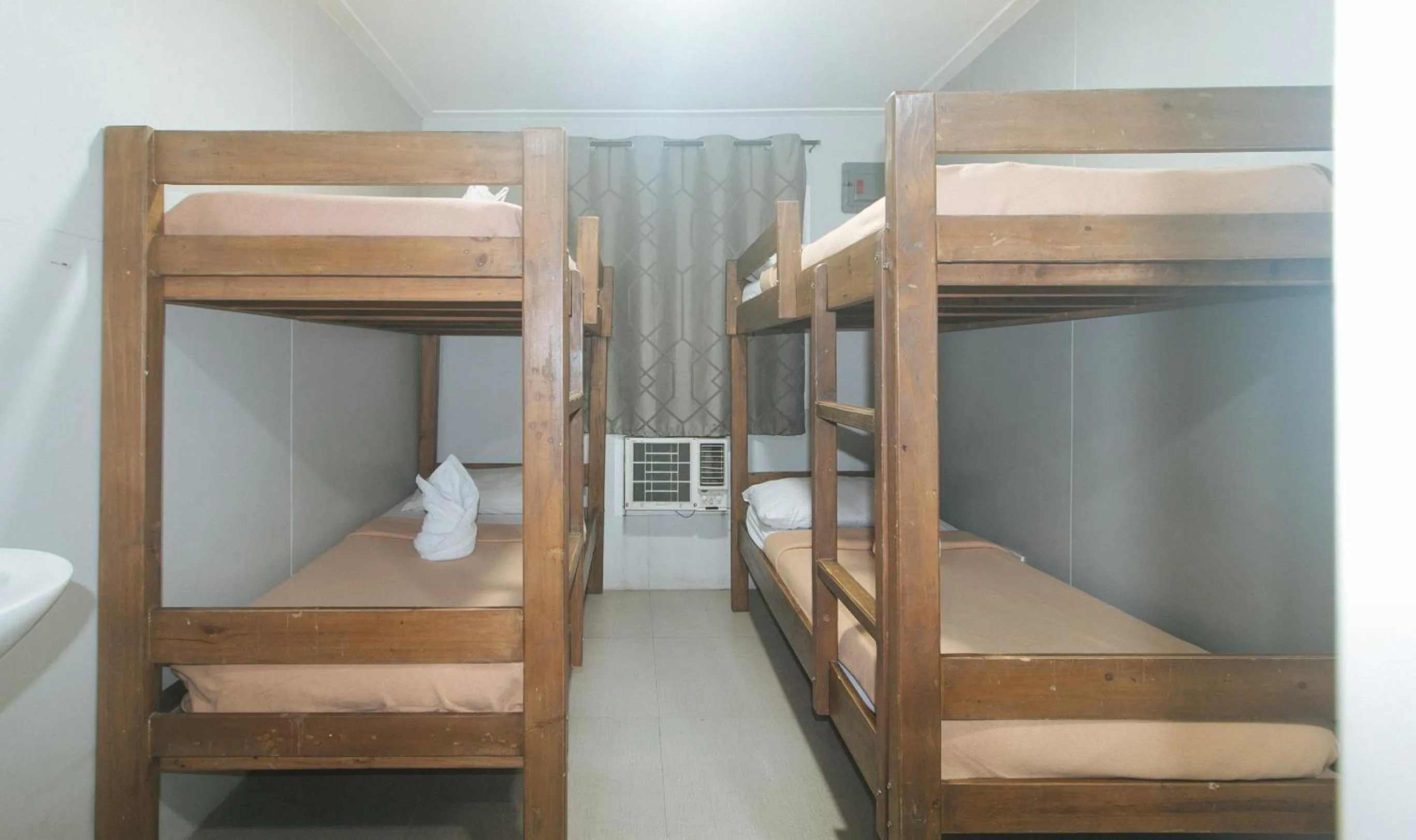 Bed in Metro Deluxe Residences near World Trade Center