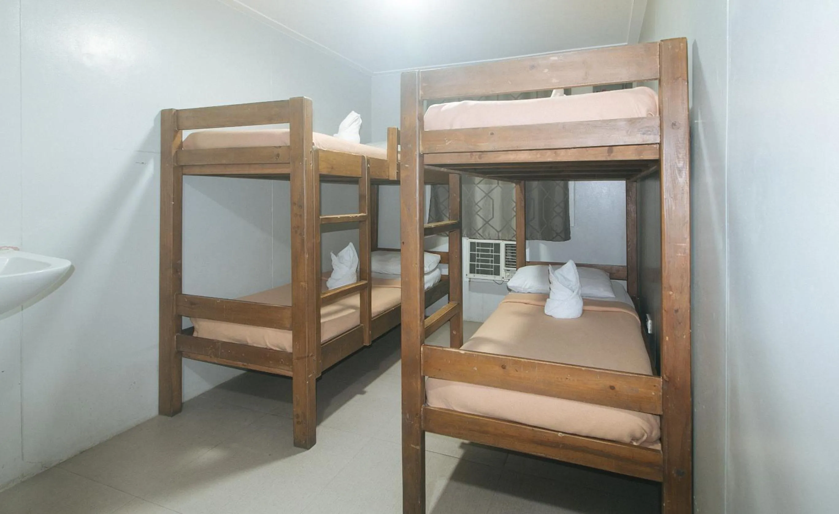 Bed in Metro Deluxe Residences near World Trade Center