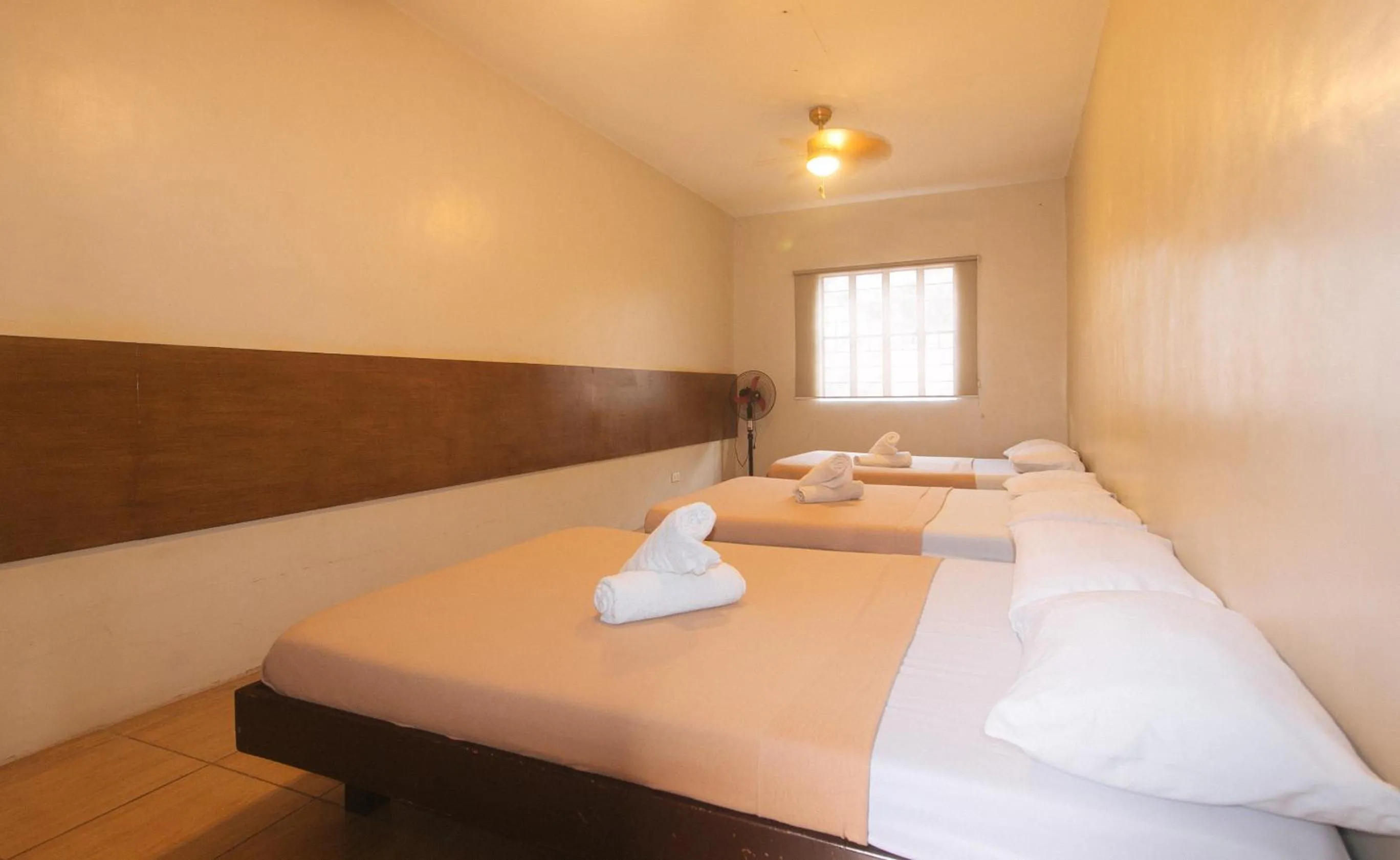 Bed in Metro Deluxe Residences near World Trade Center