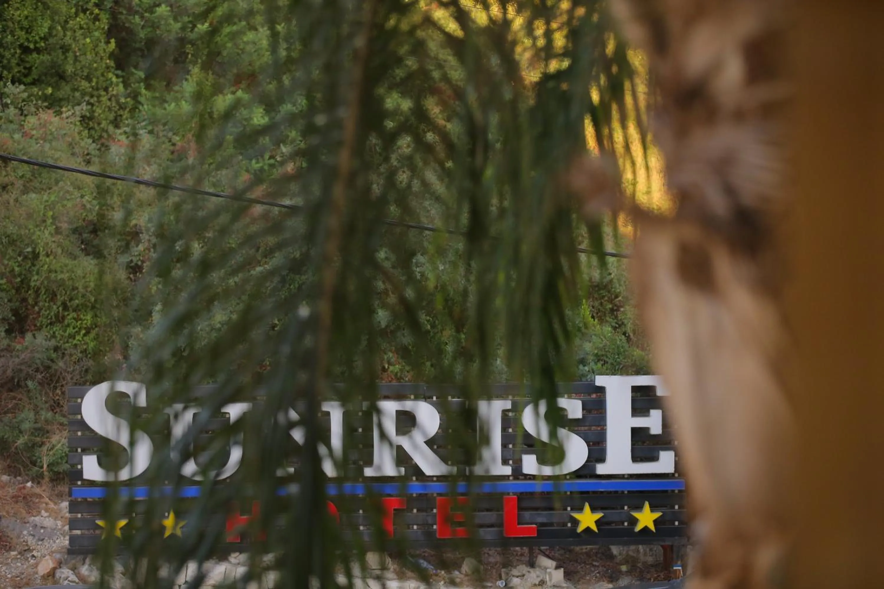 Property logo or sign in Sunrise Hotel