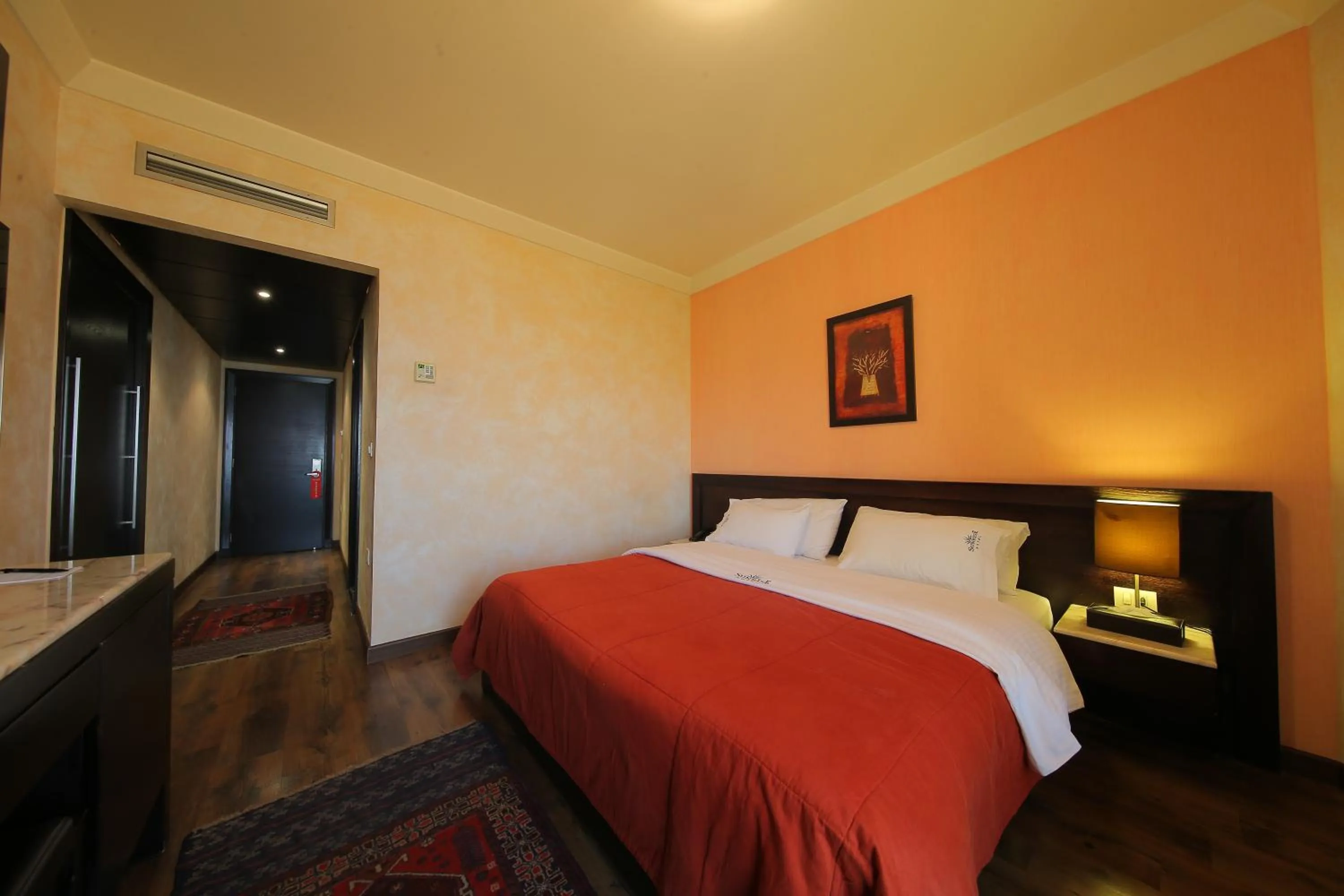 Bed in Sunrise Hotel