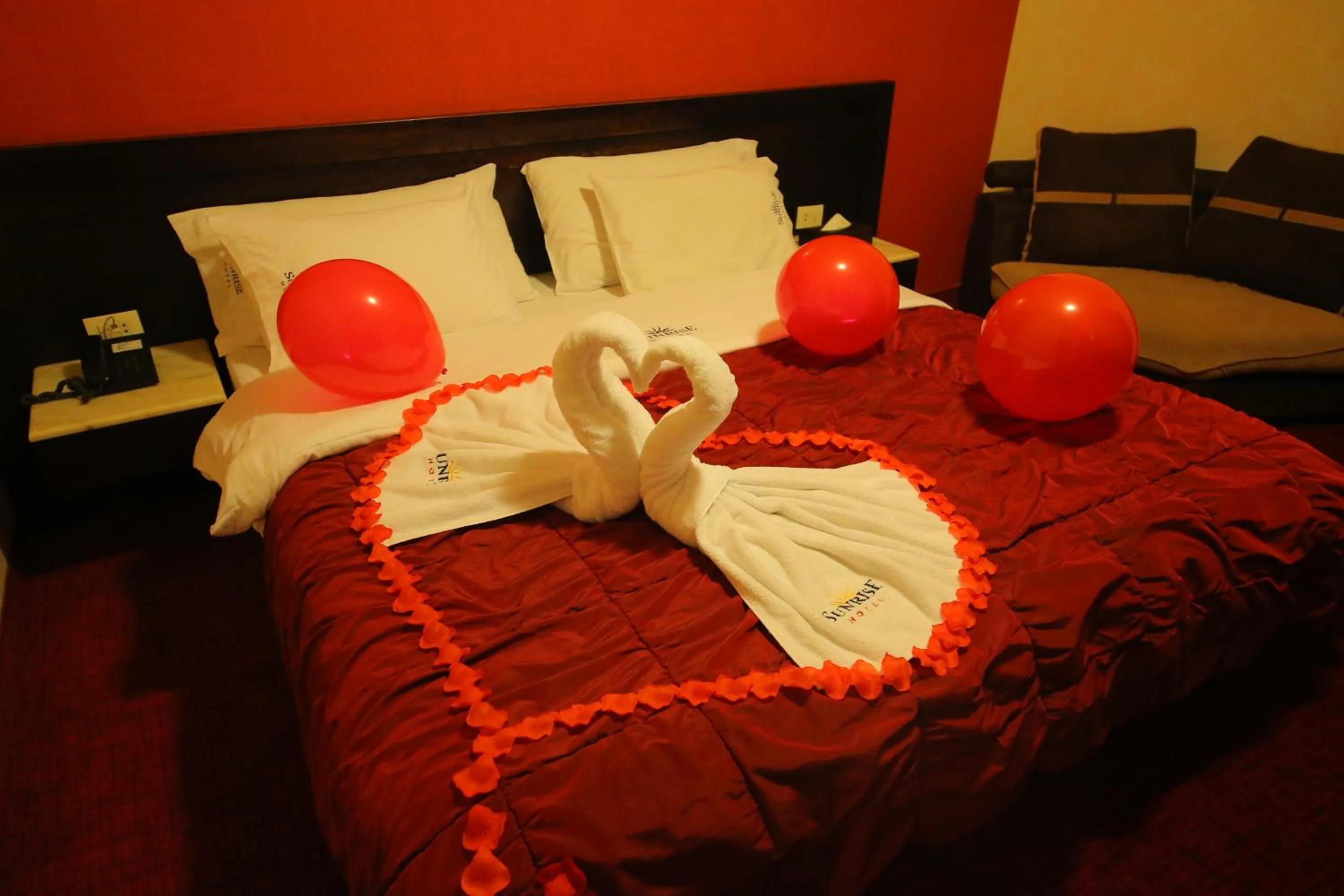 Bed in Sunrise Hotel