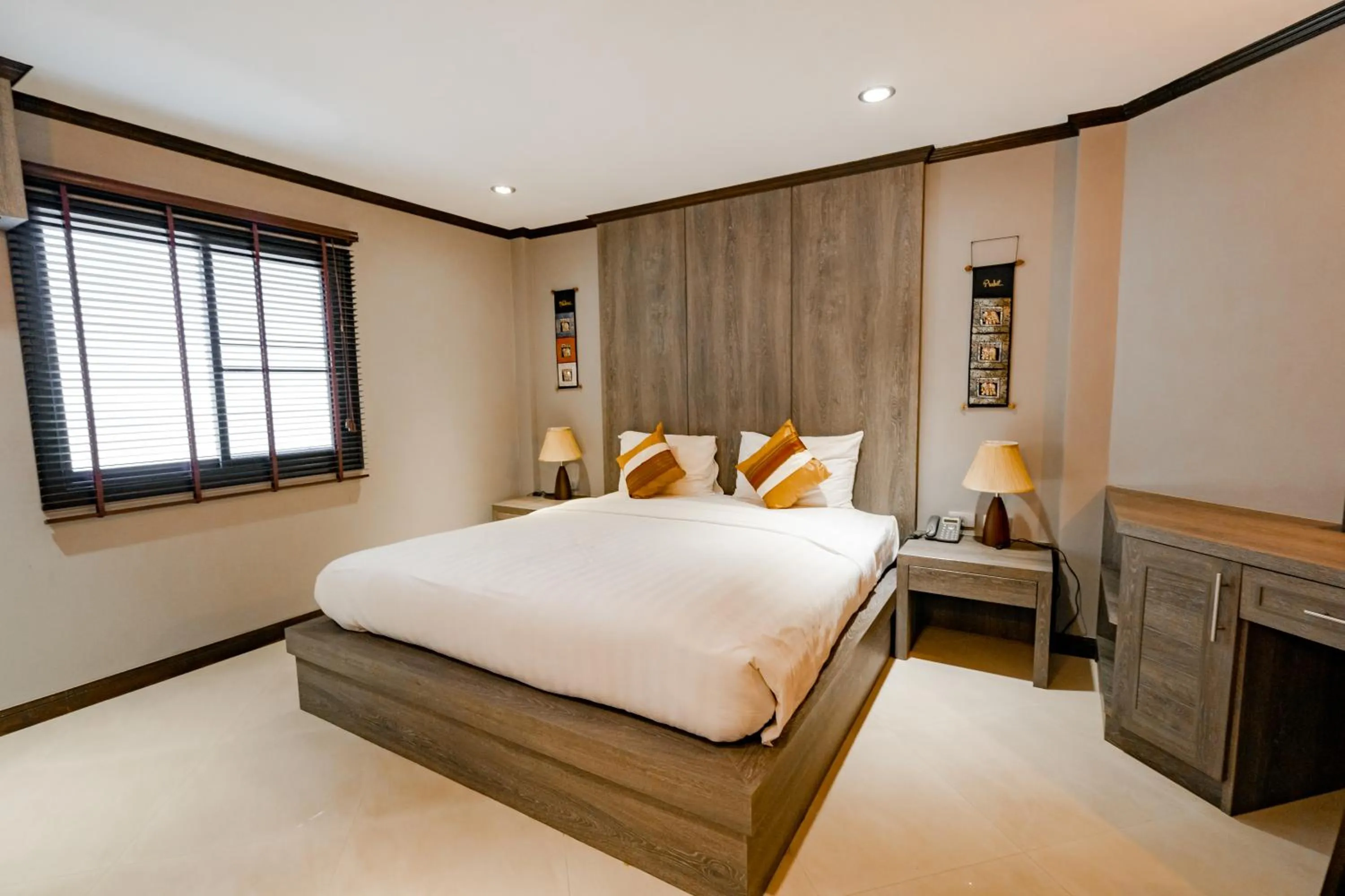Bed in Naiya Buree Boutique Resort Nai Harn Beach