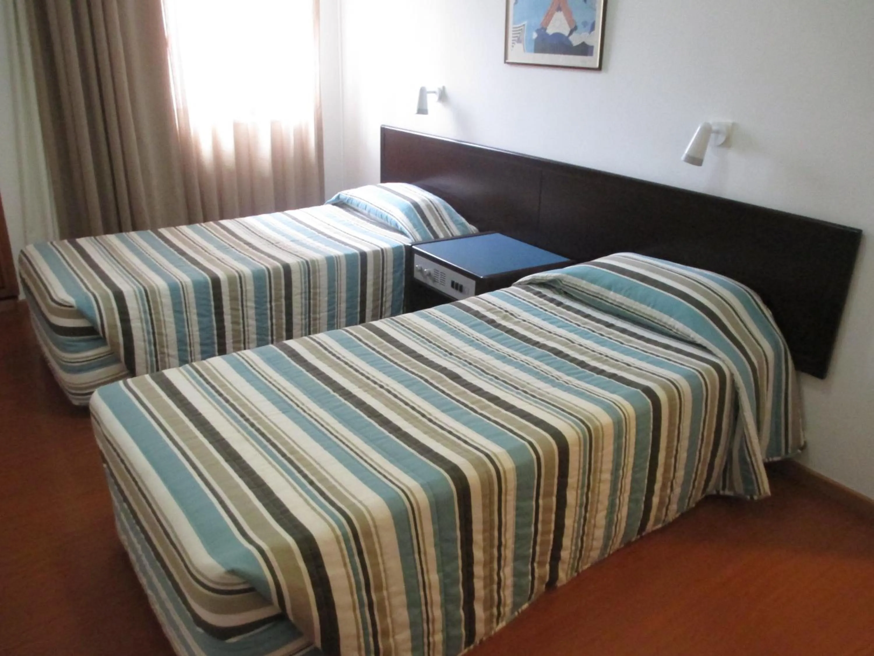 Bed in Atrium Zenon Hotel Apartments