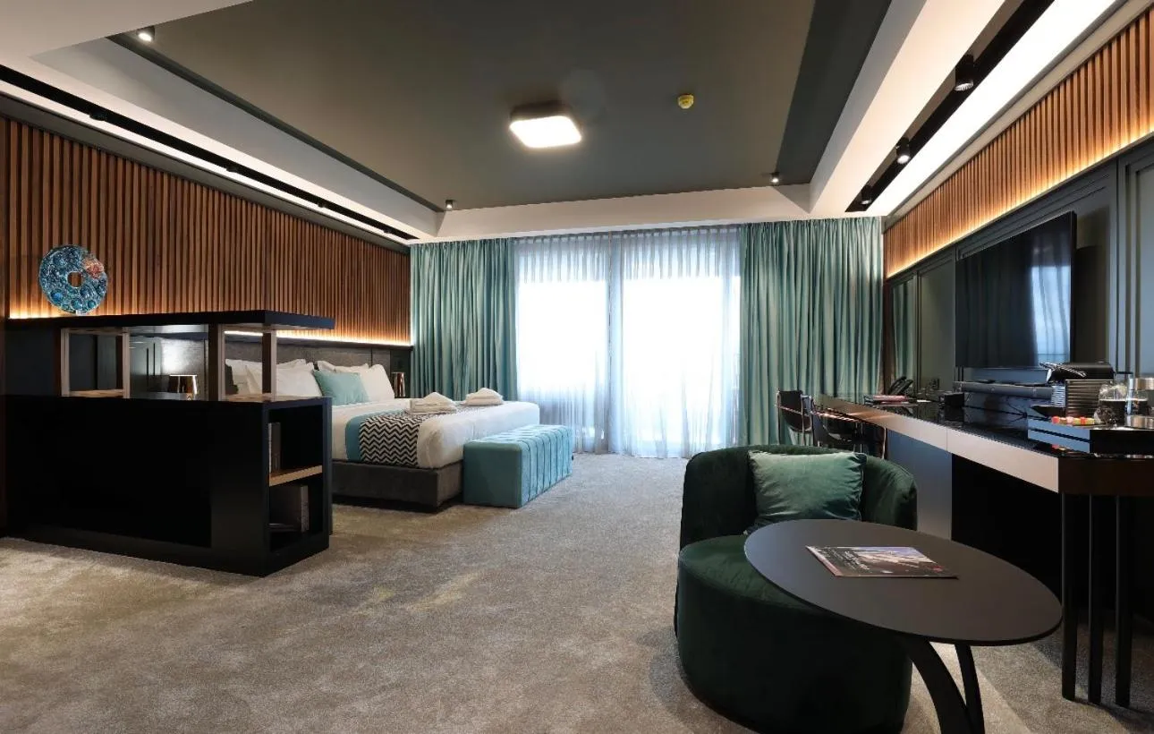 Bed in Panoramika Design Hotel