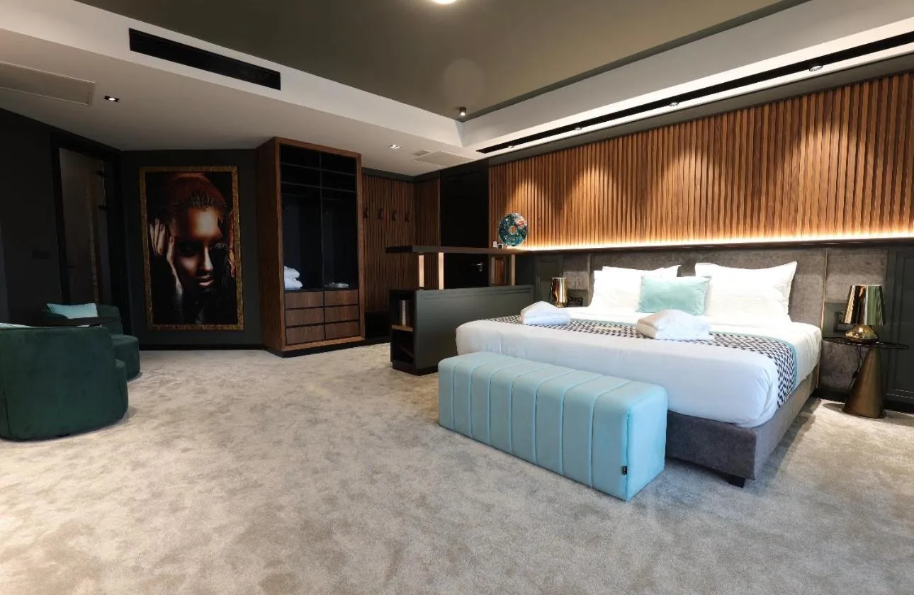 Bed in Panoramika Design Hotel