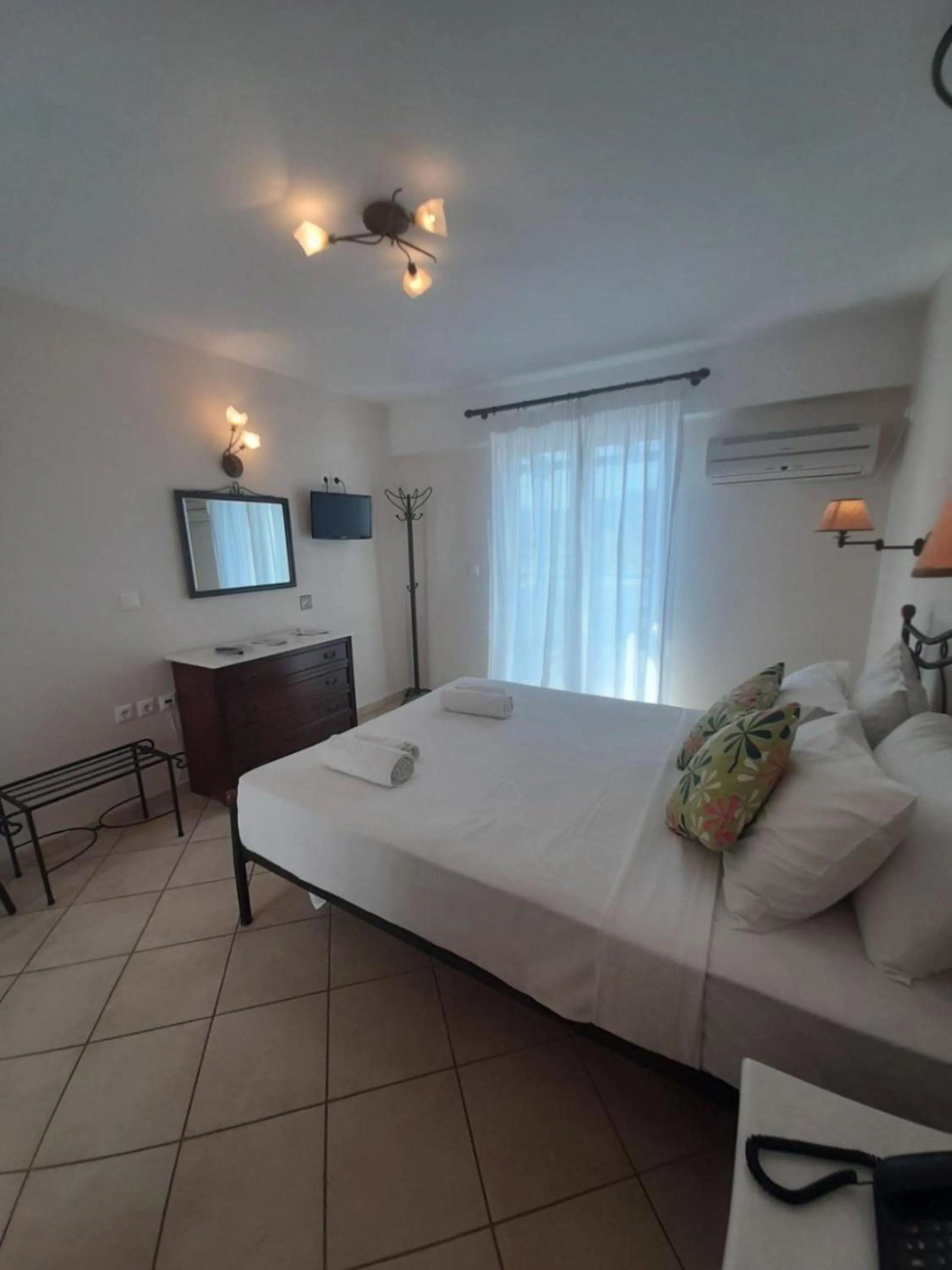 Bed in Romantica Hotel