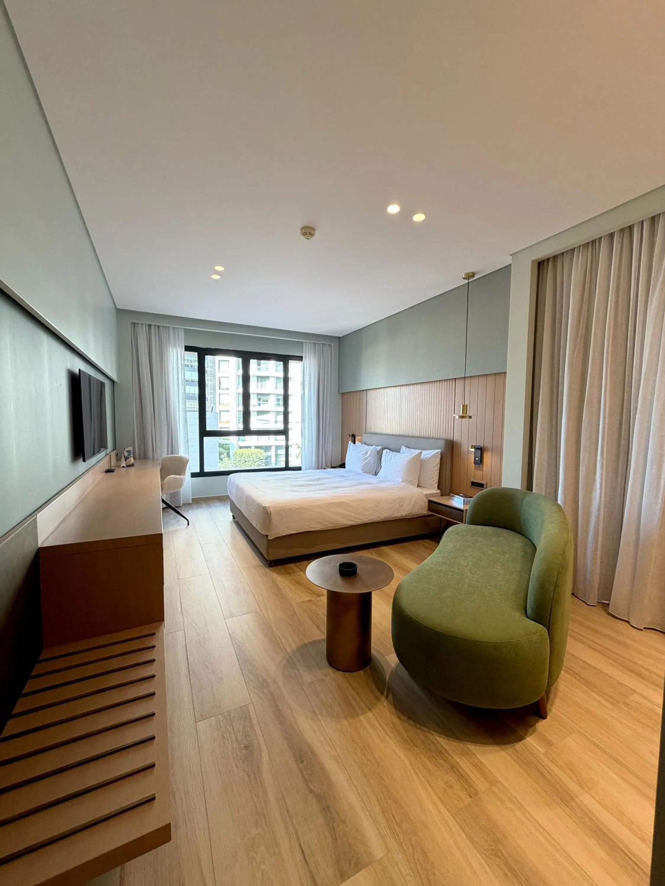 Bed in ParkTower Suites