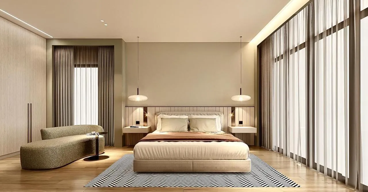 Bed in ParkTower Suites