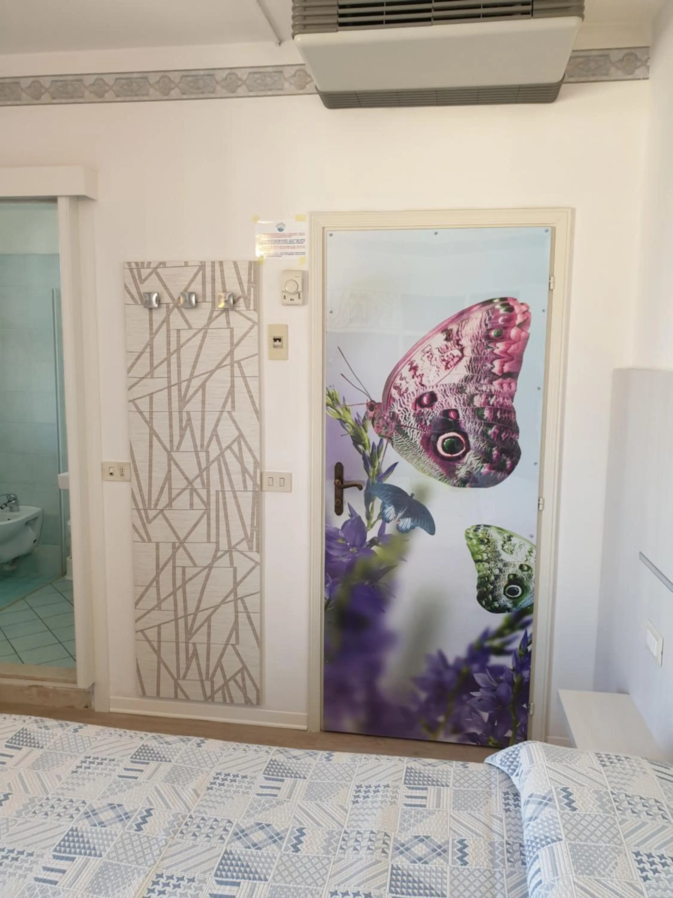 Decorative detail, Bed in Hotel Losanna Cervia