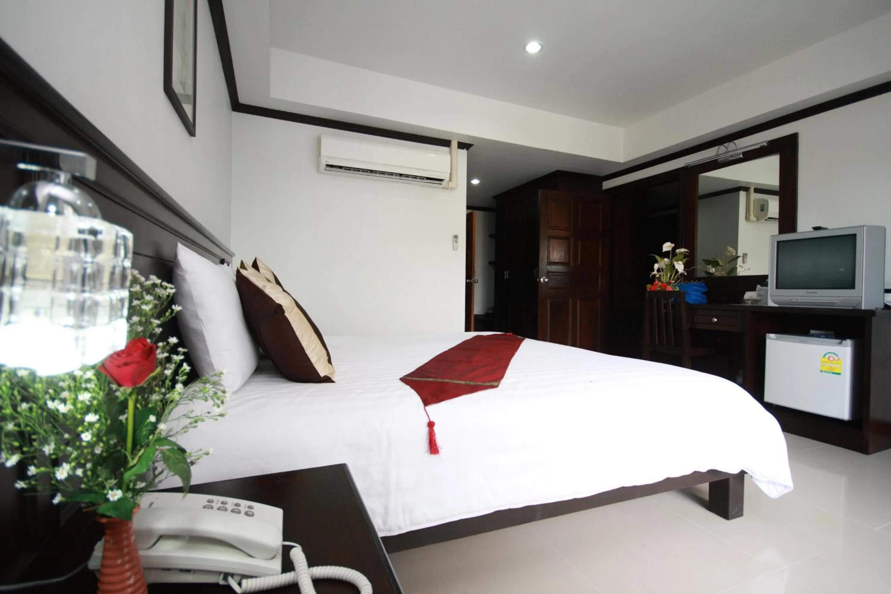 Bed in First Residence Hotel