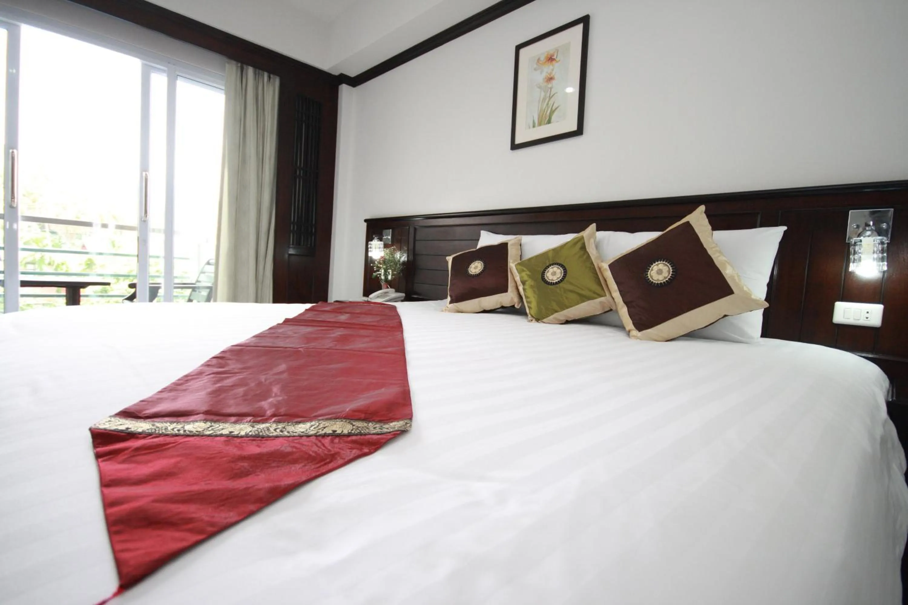 Bed in First Residence Hotel