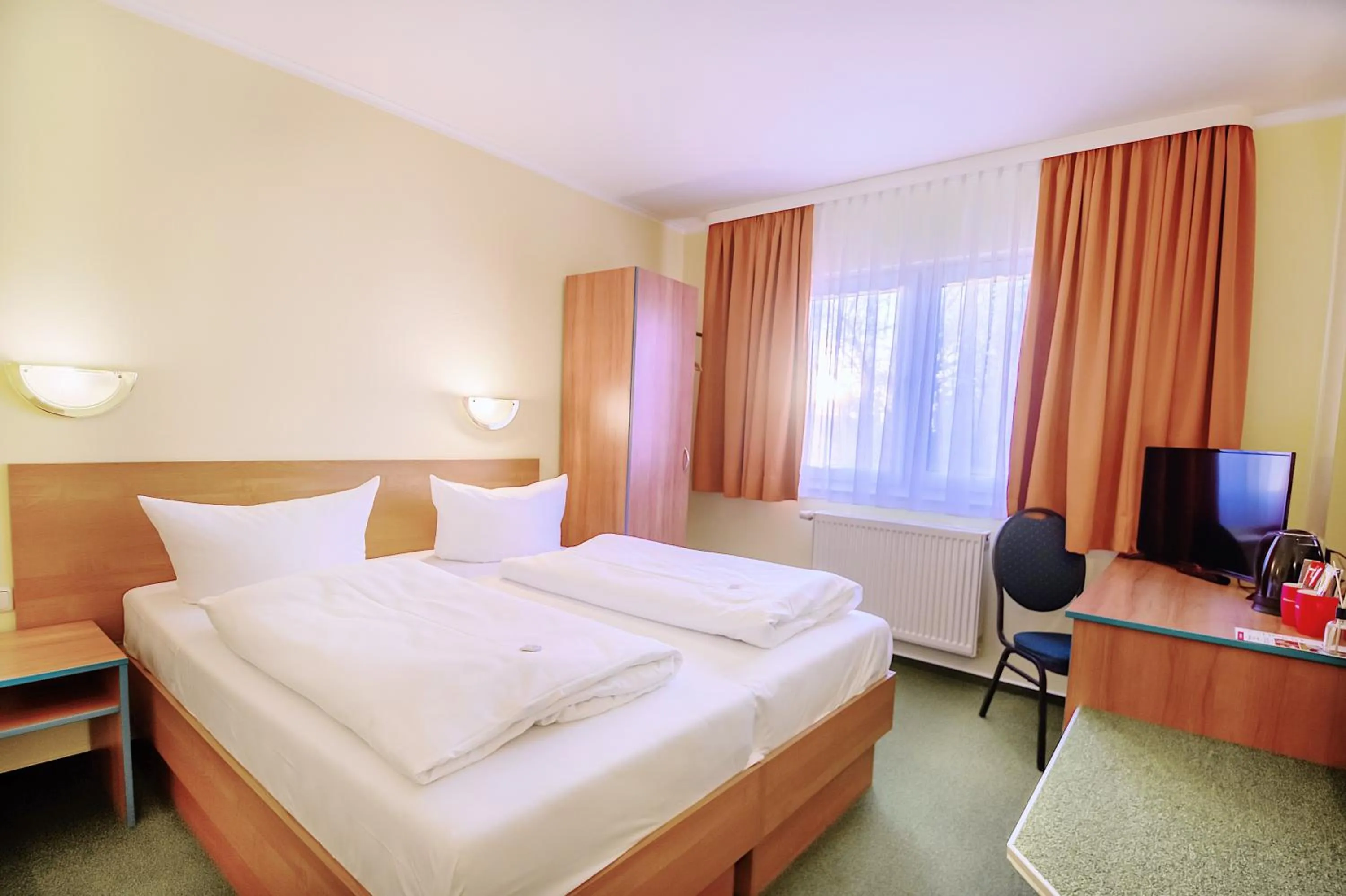 Bed in REGIOHOTEL Halle Leipzig Airport