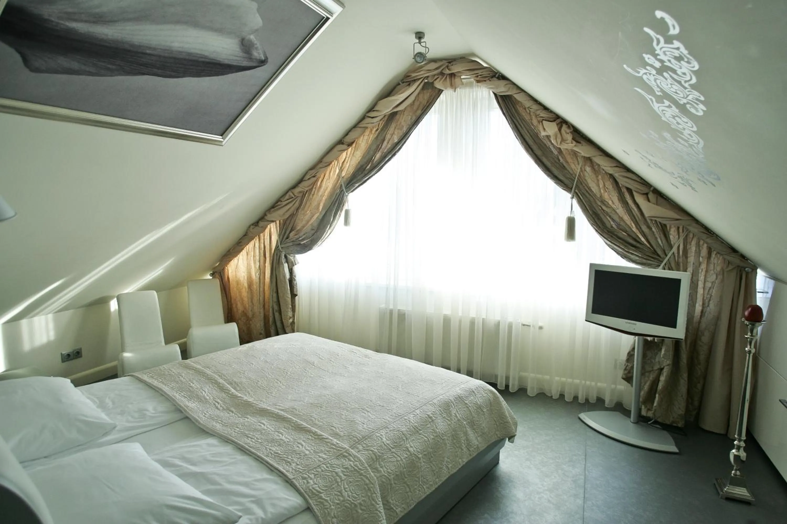 Bed in Boutique Hotel Mama