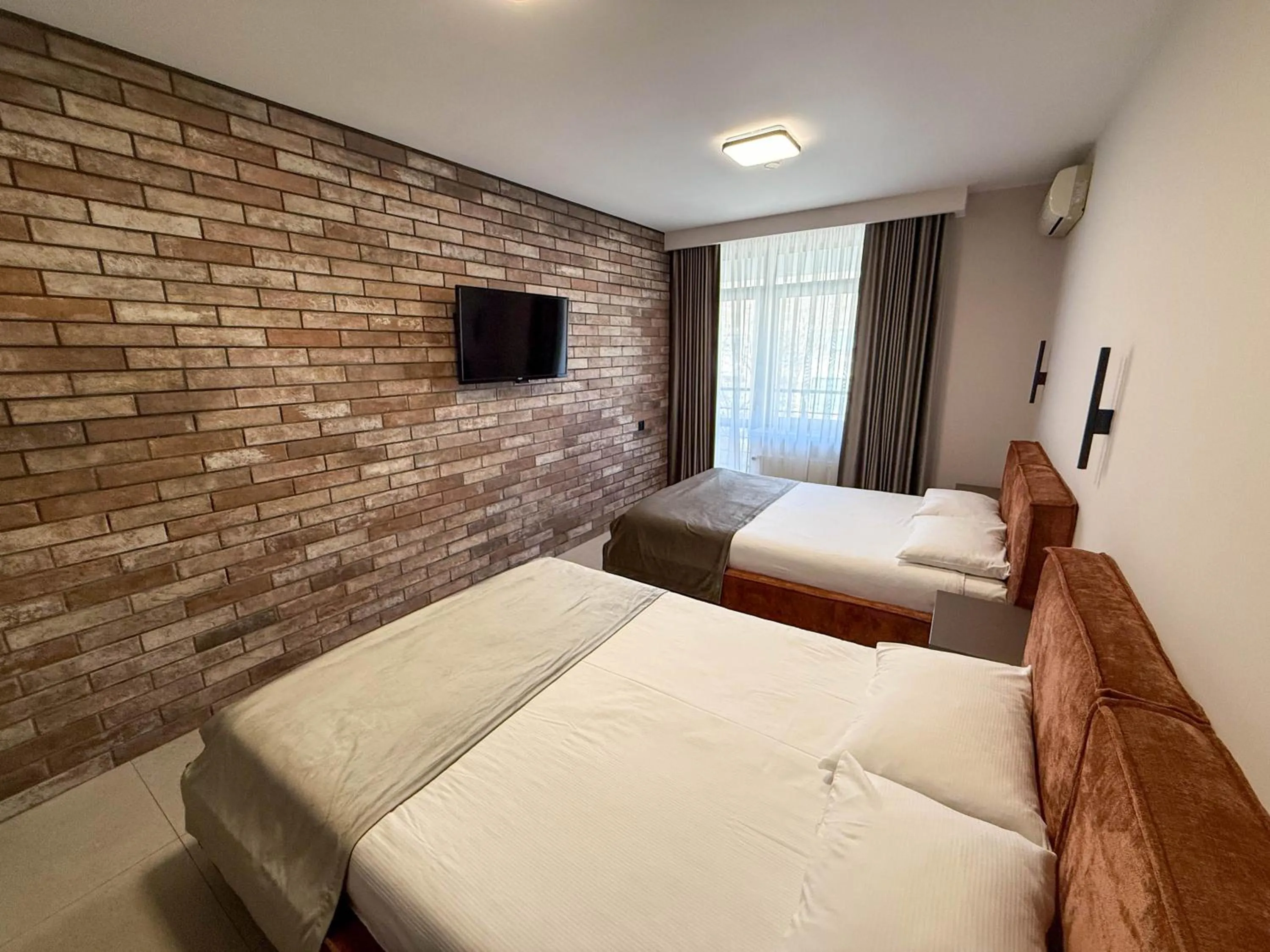 Bed in Komilfo Hotel