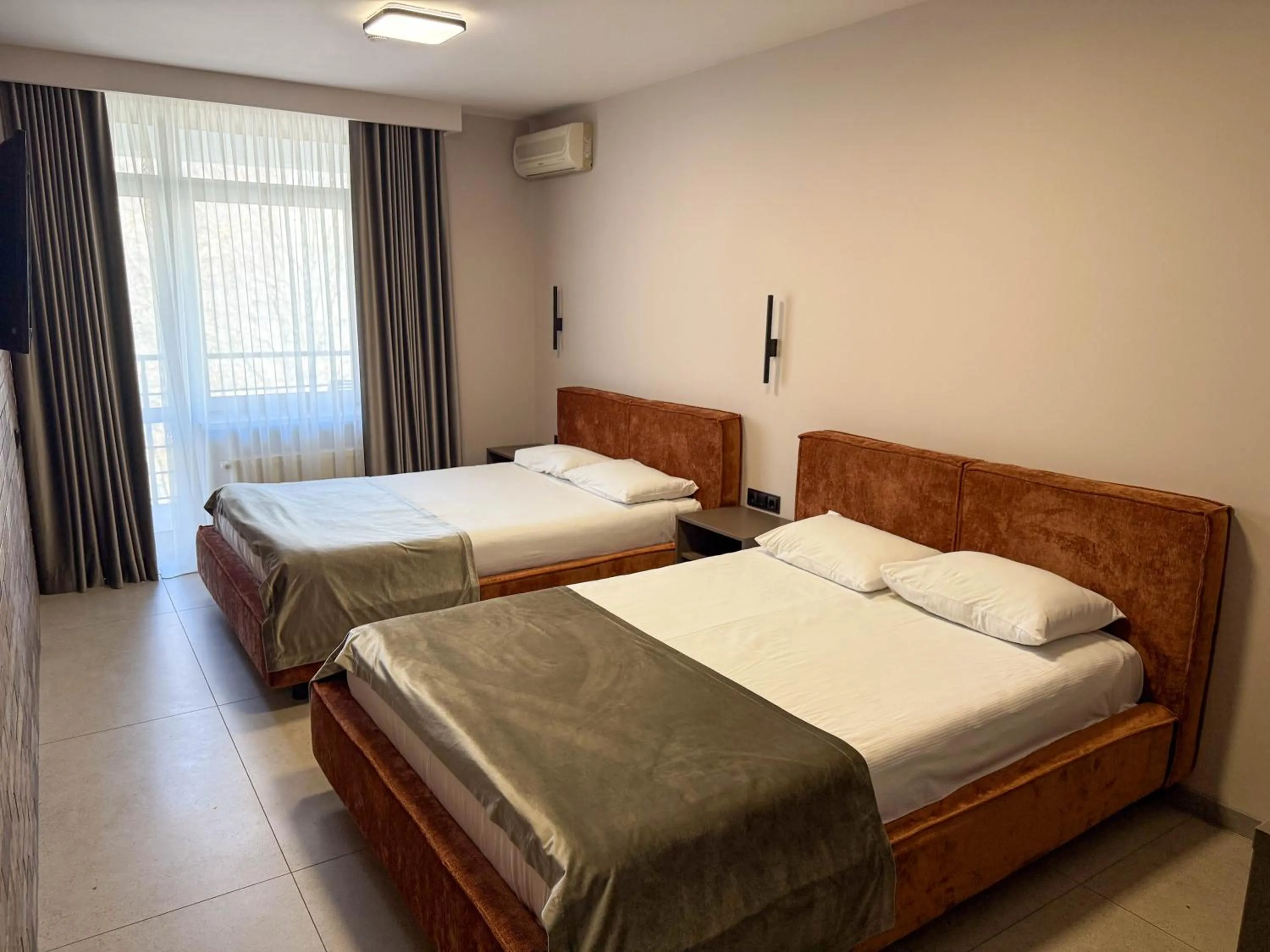 Bed in Komilfo Hotel