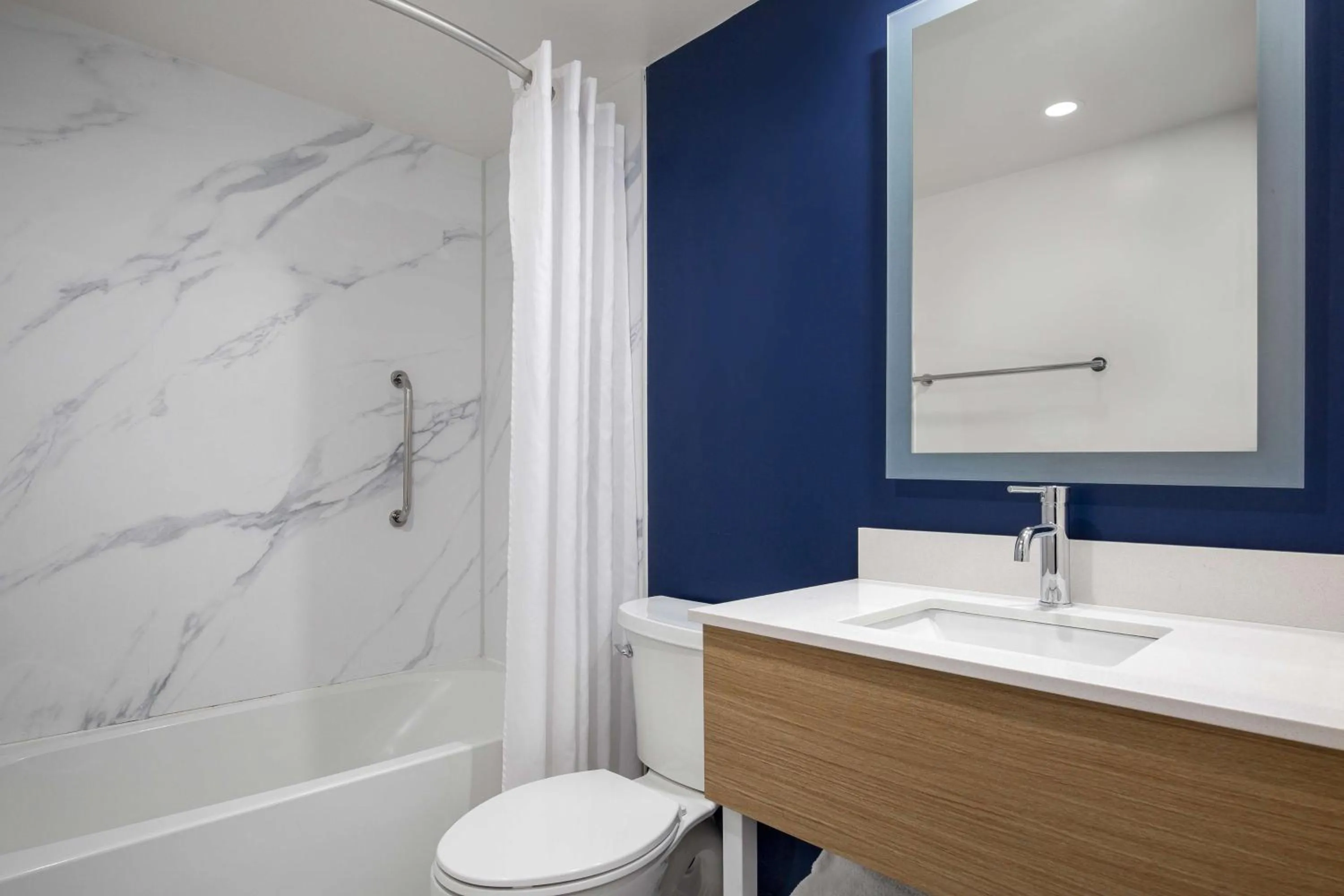 Bathroom in Spark by Hilton Brockville