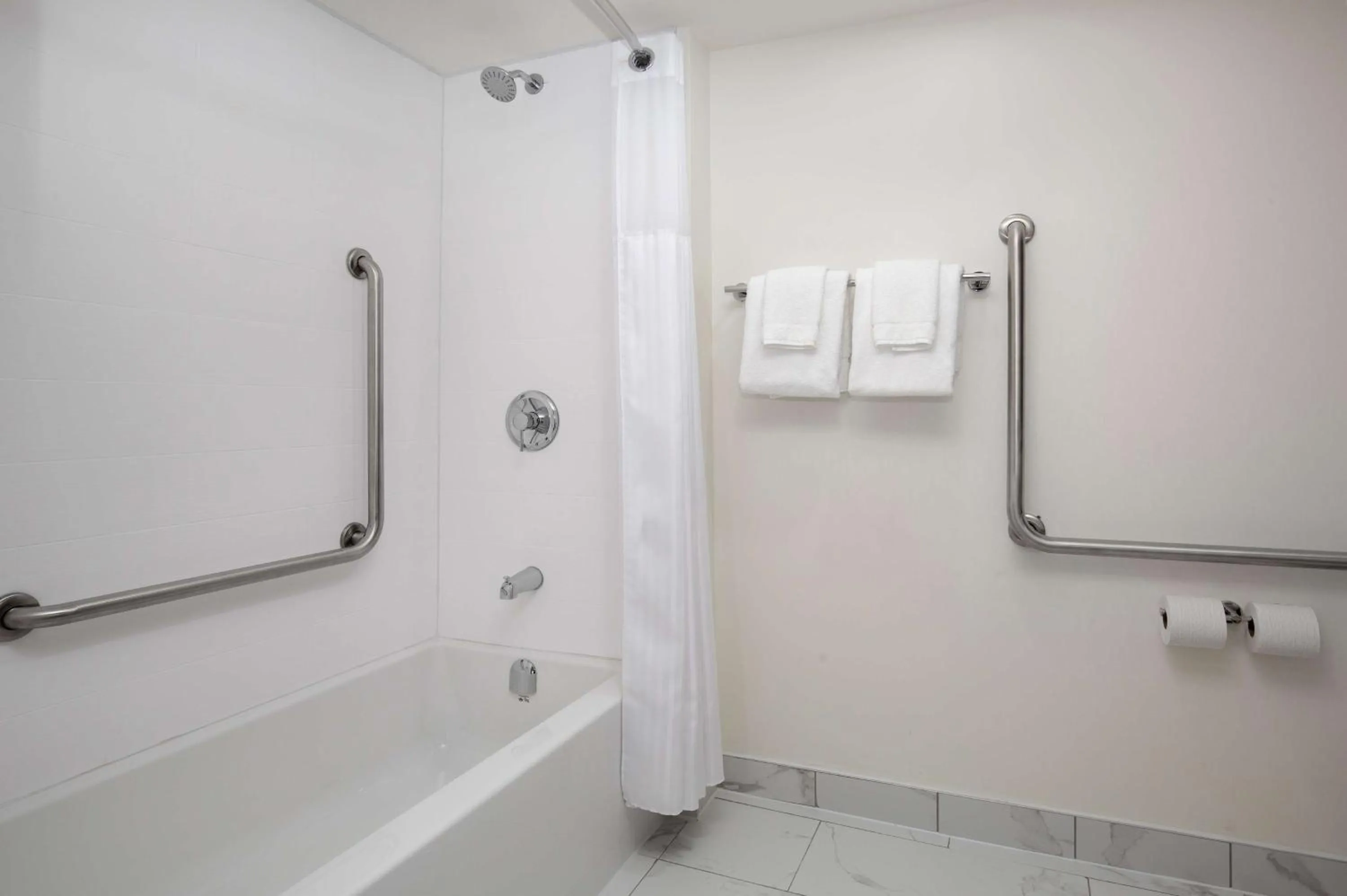 Bathroom in Spark by Hilton Brockville