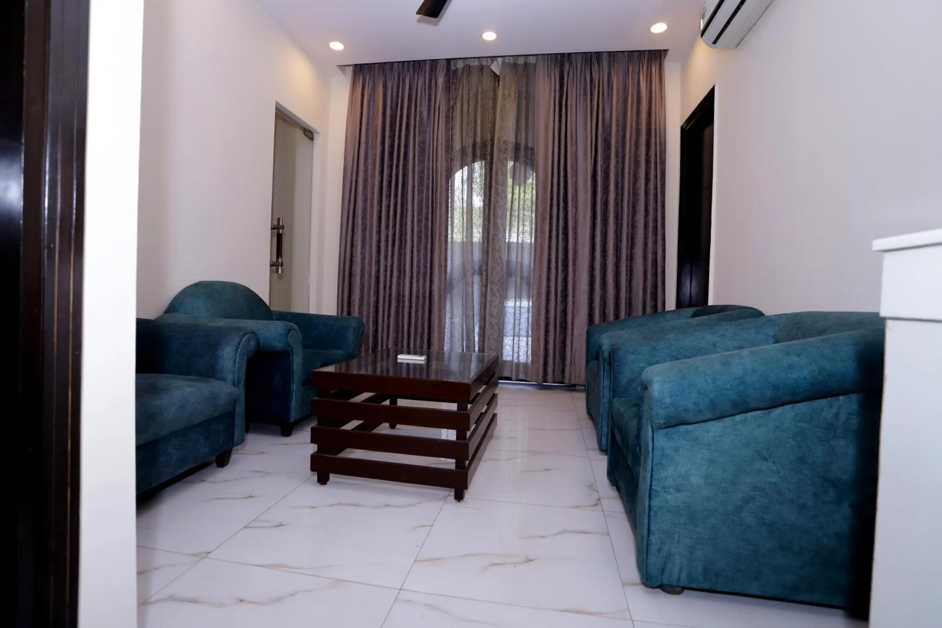 Living room in Hotel PK Residency Sector 18 Noida