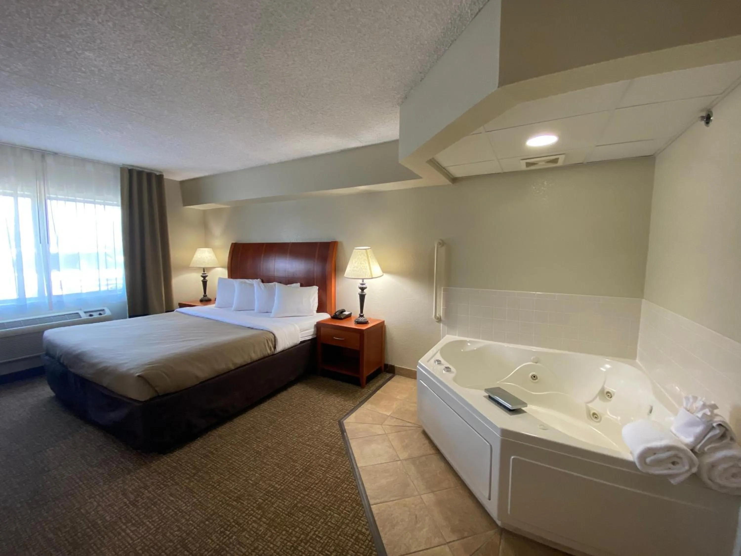Bedroom, Bed in MountainView Lodge and Suites