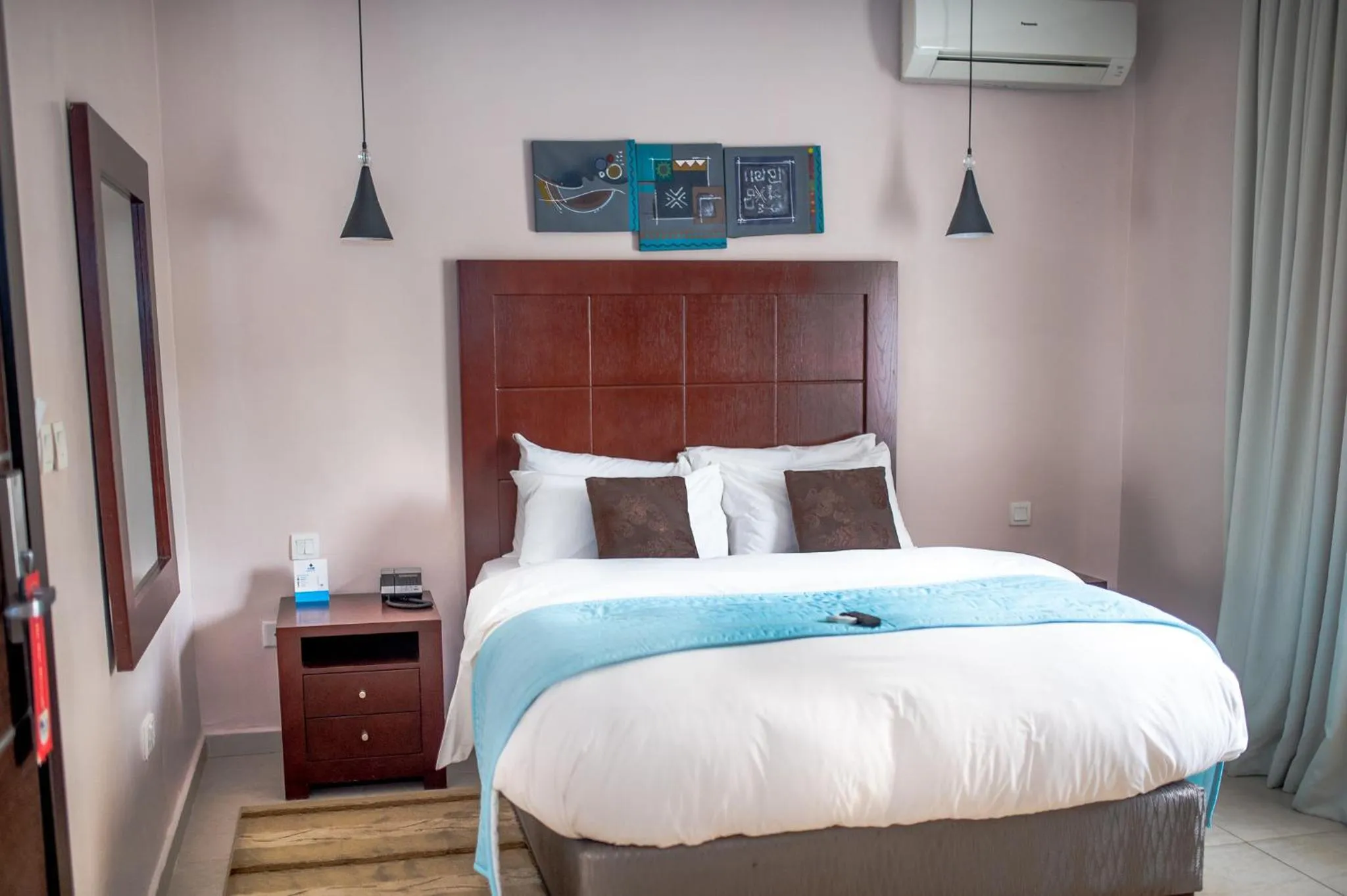 Bed in Ace Premier Hotel