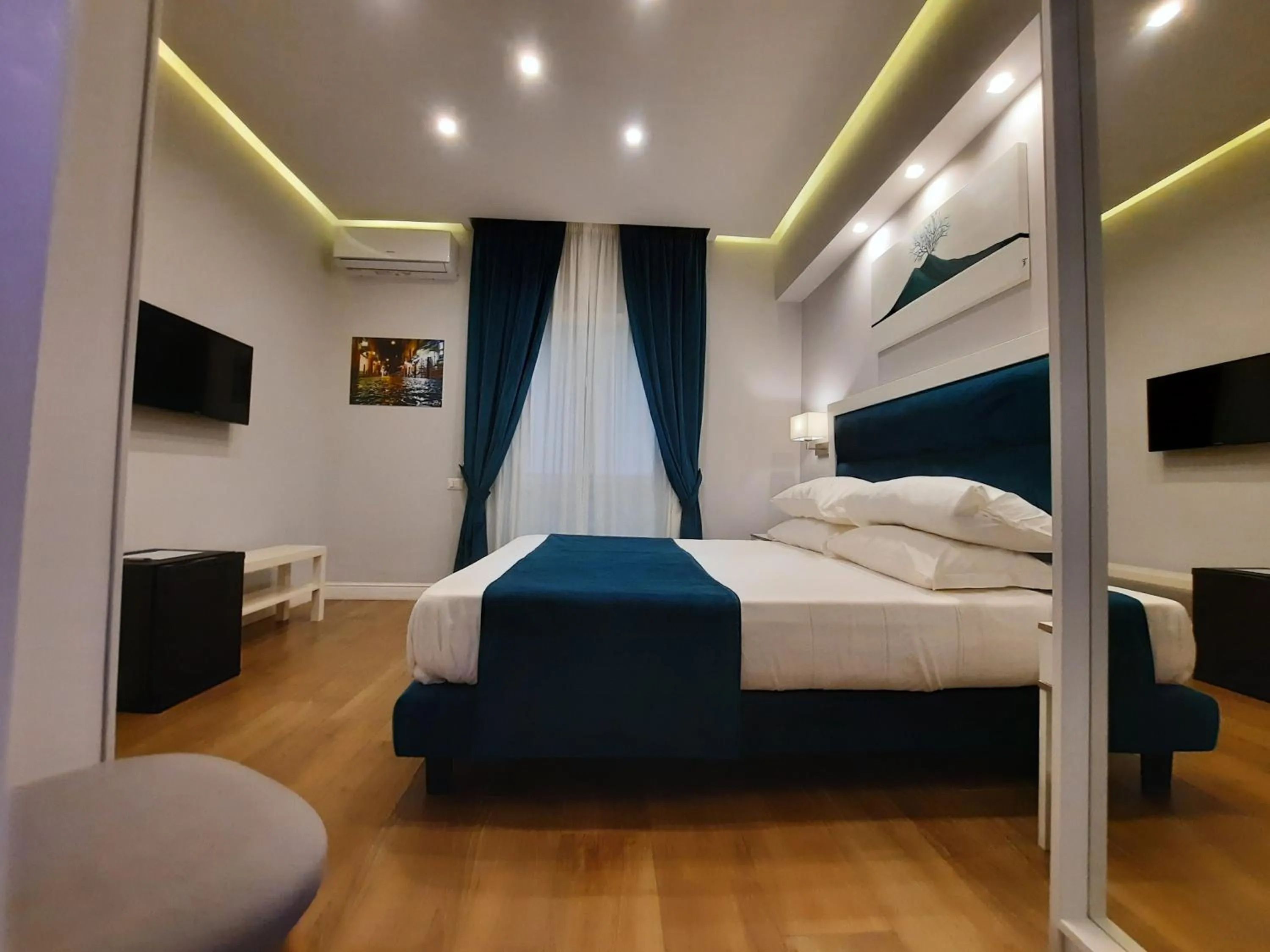 Photo of the whole room, Bed in Gea suite