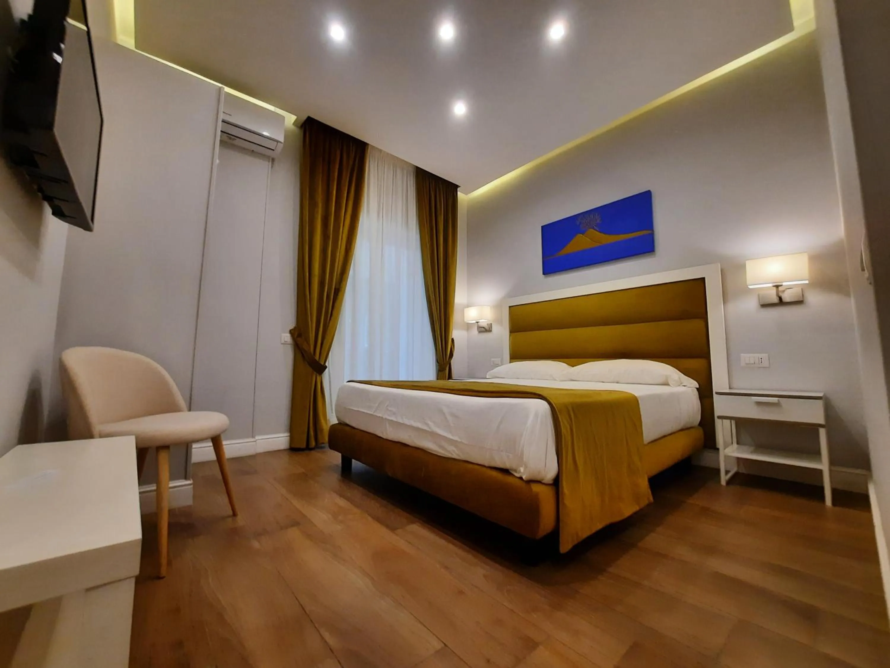 Photo of the whole room, Bed in Gea suite