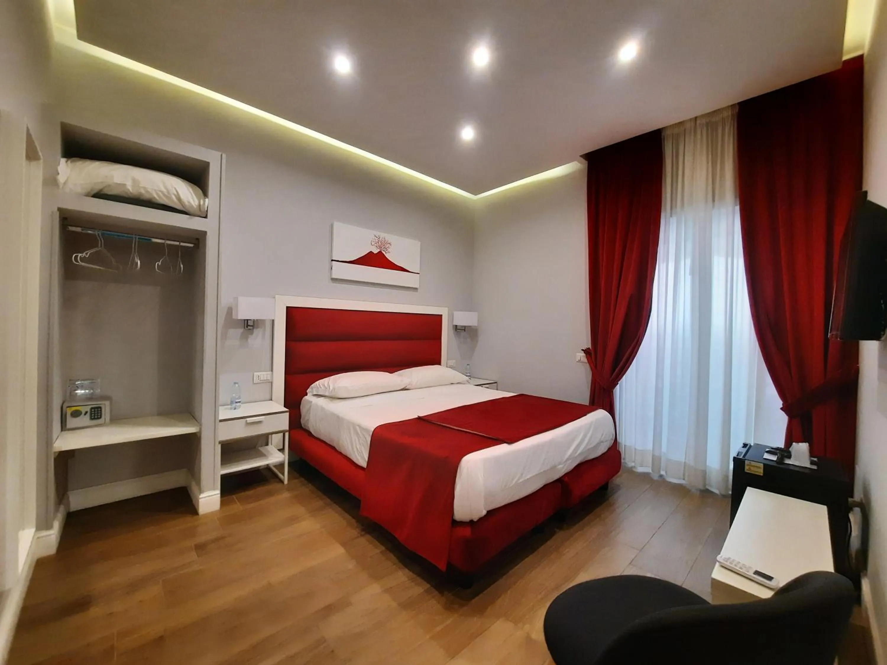 Photo of the whole room, Bed in Gea suite