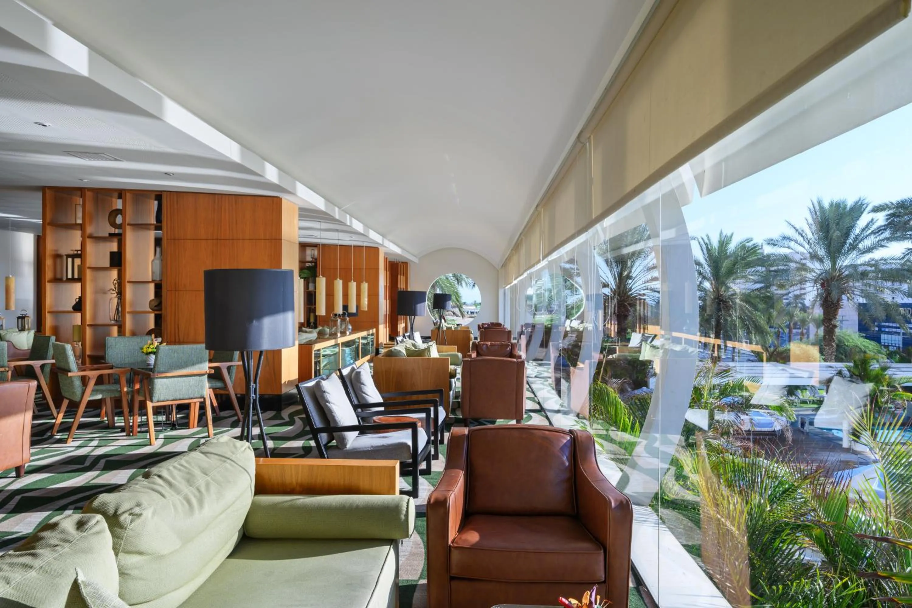 Seating area in Noga by Isrotel Collection