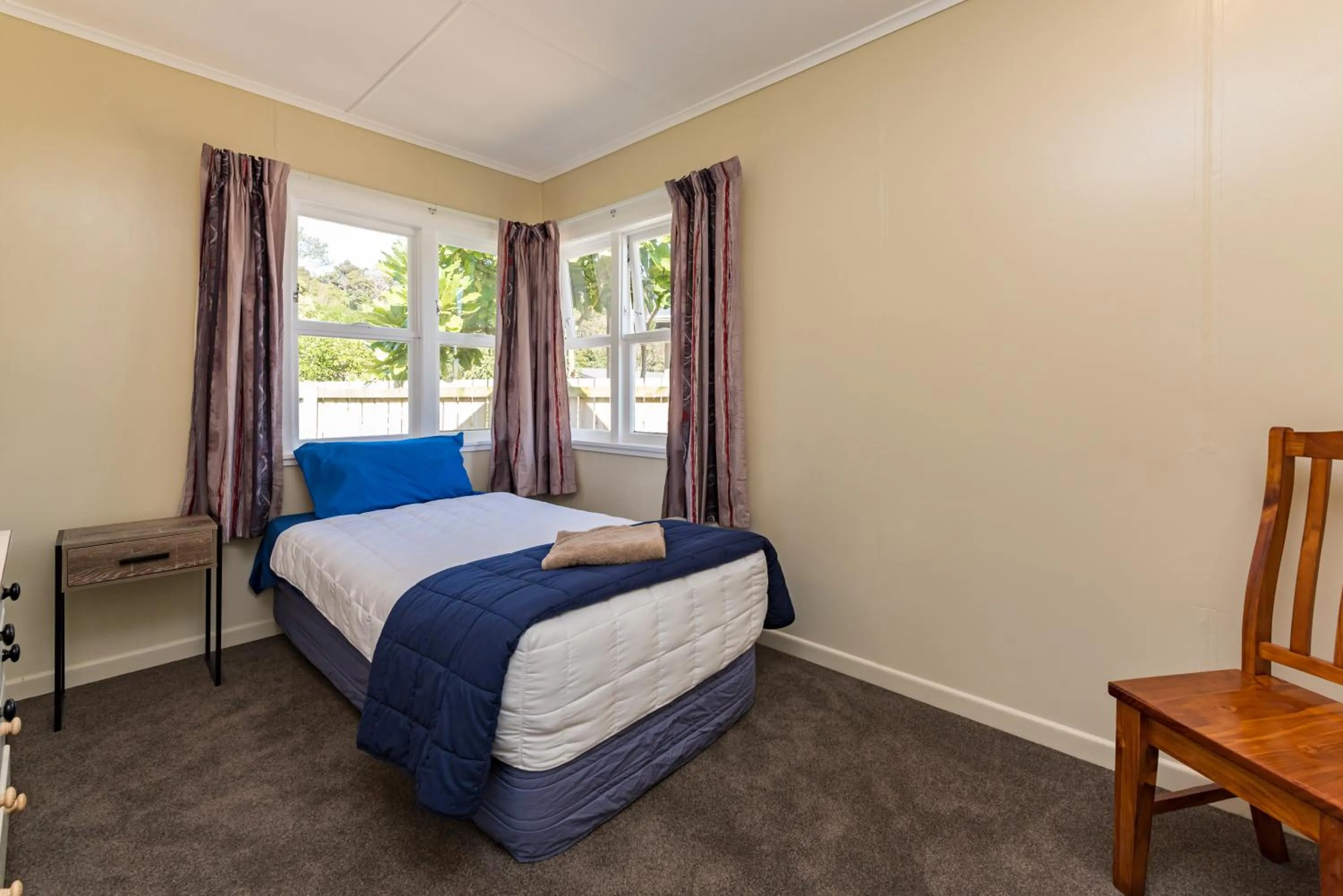 Bedroom in Waitangi Beach Bach 30B