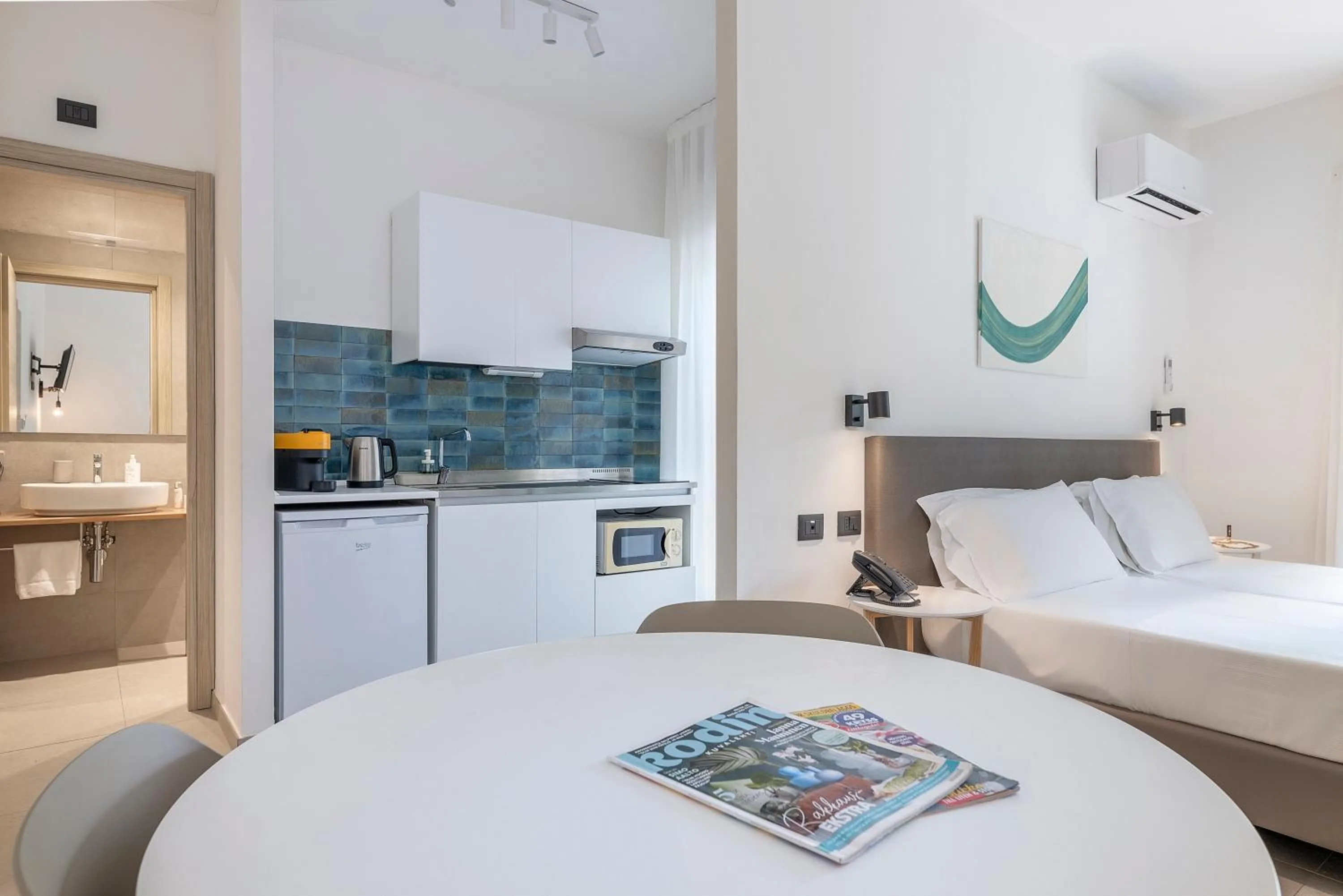 Kitchen or kitchenette, Bed in Residence Villa Giardini