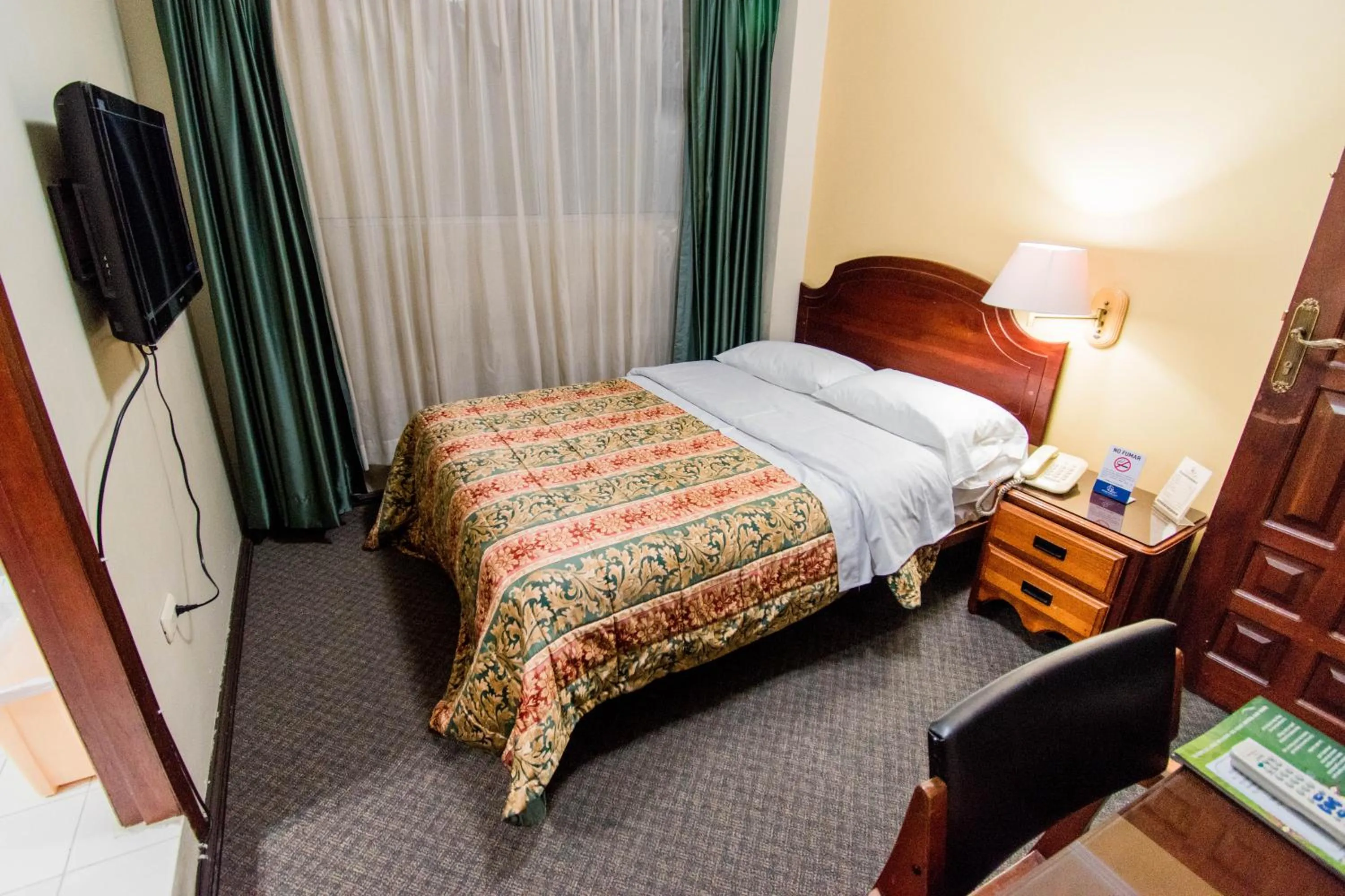 Bed in Grand Hotel Loja